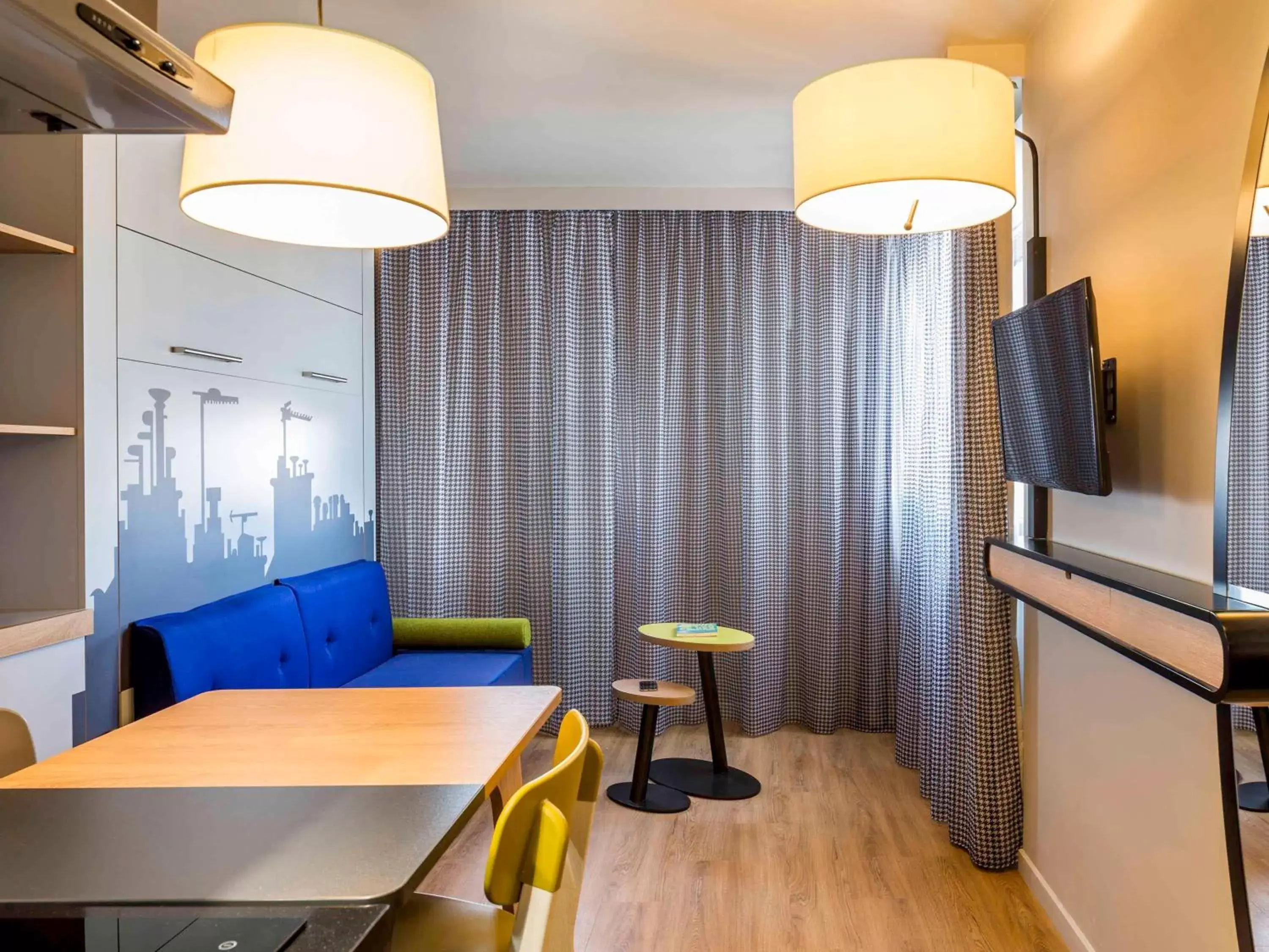 Bedroom, Dining Area in Aparthotel Adagio access Montpellier Centre