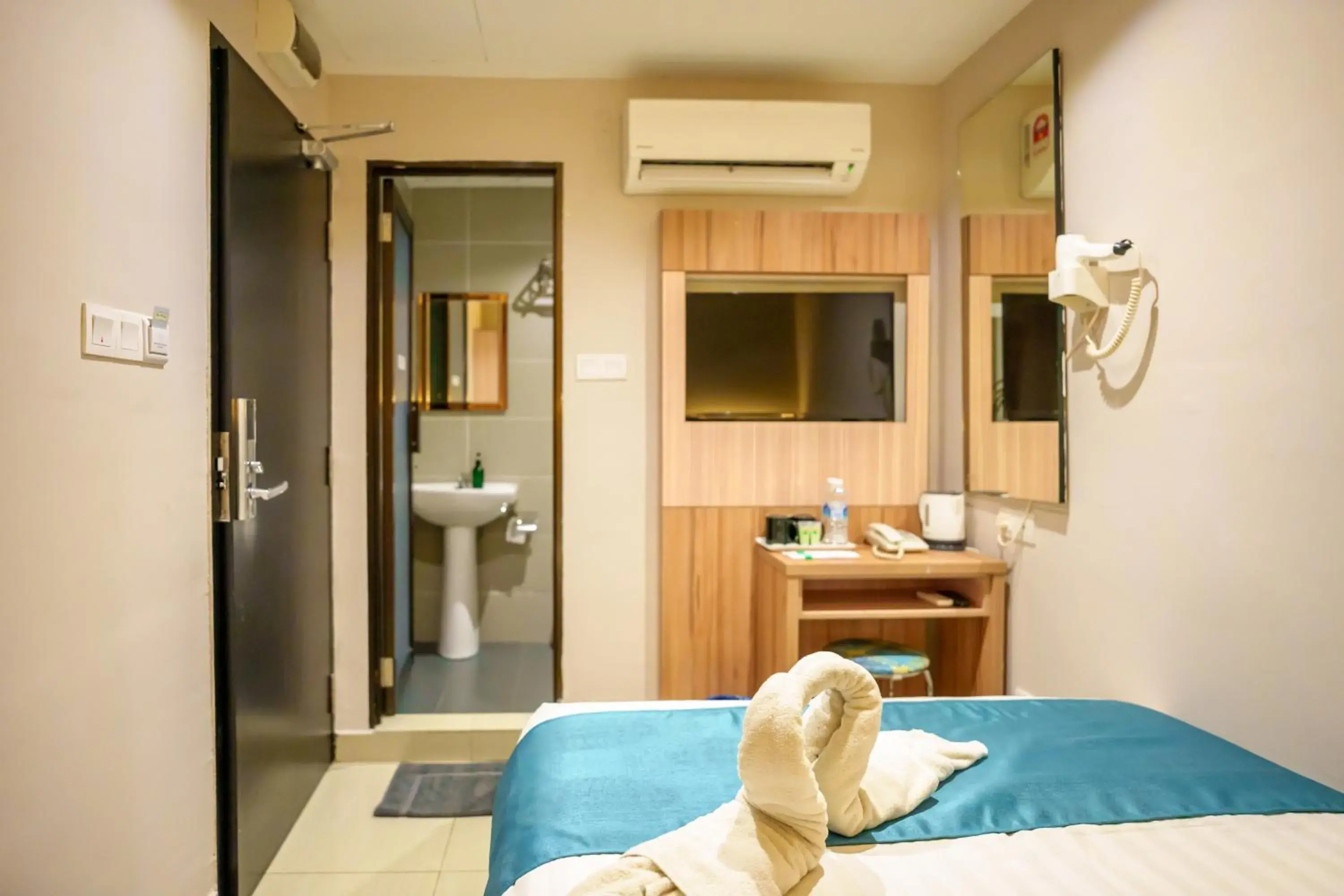 Toilet, Bed in Alaxis Hotel Toilet, Bed in Alaxis Hotel