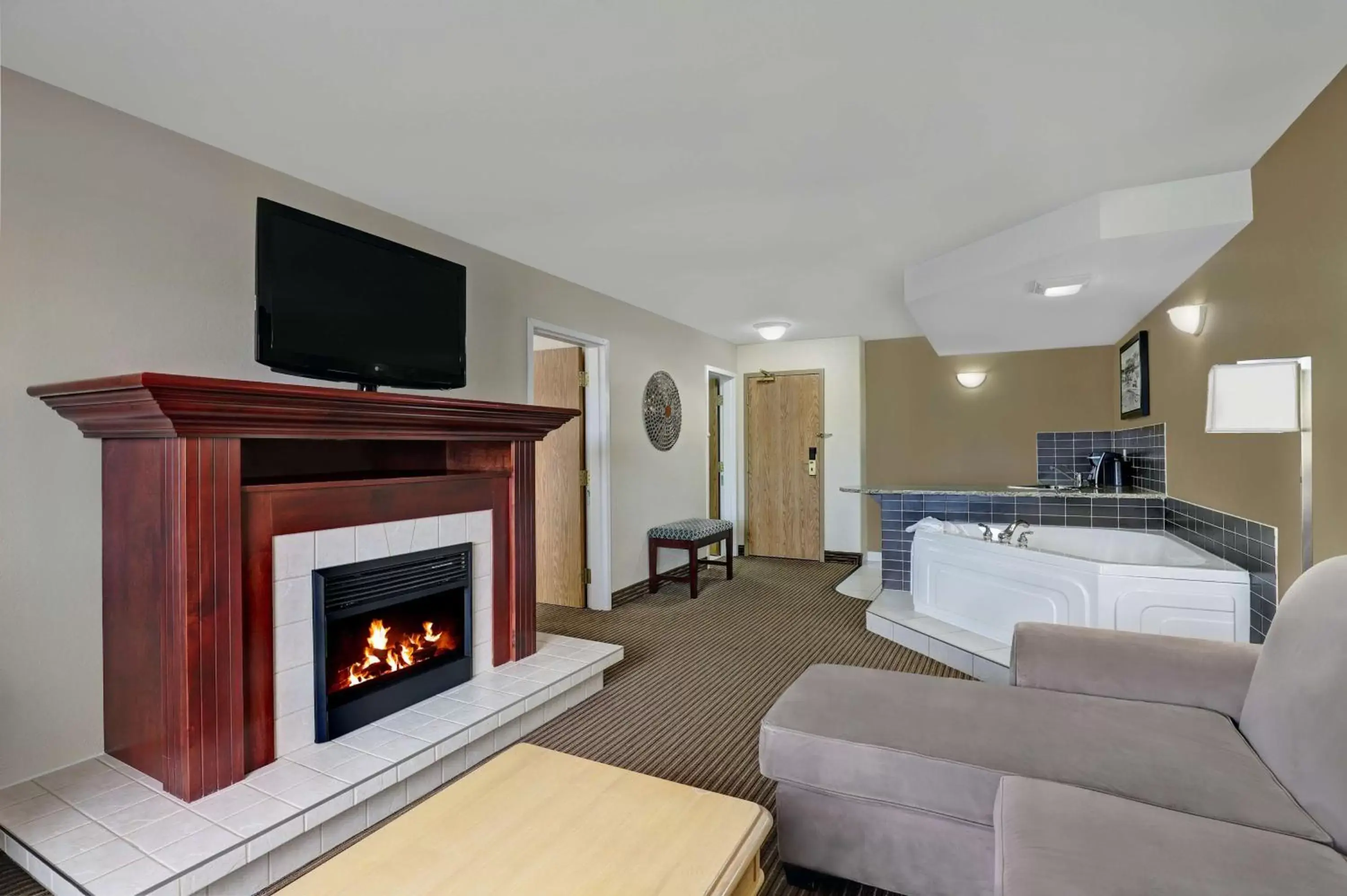 Photo of the whole room, TV/Entertainment Center in SureStay Plus Hotel by Best Western Drumheller