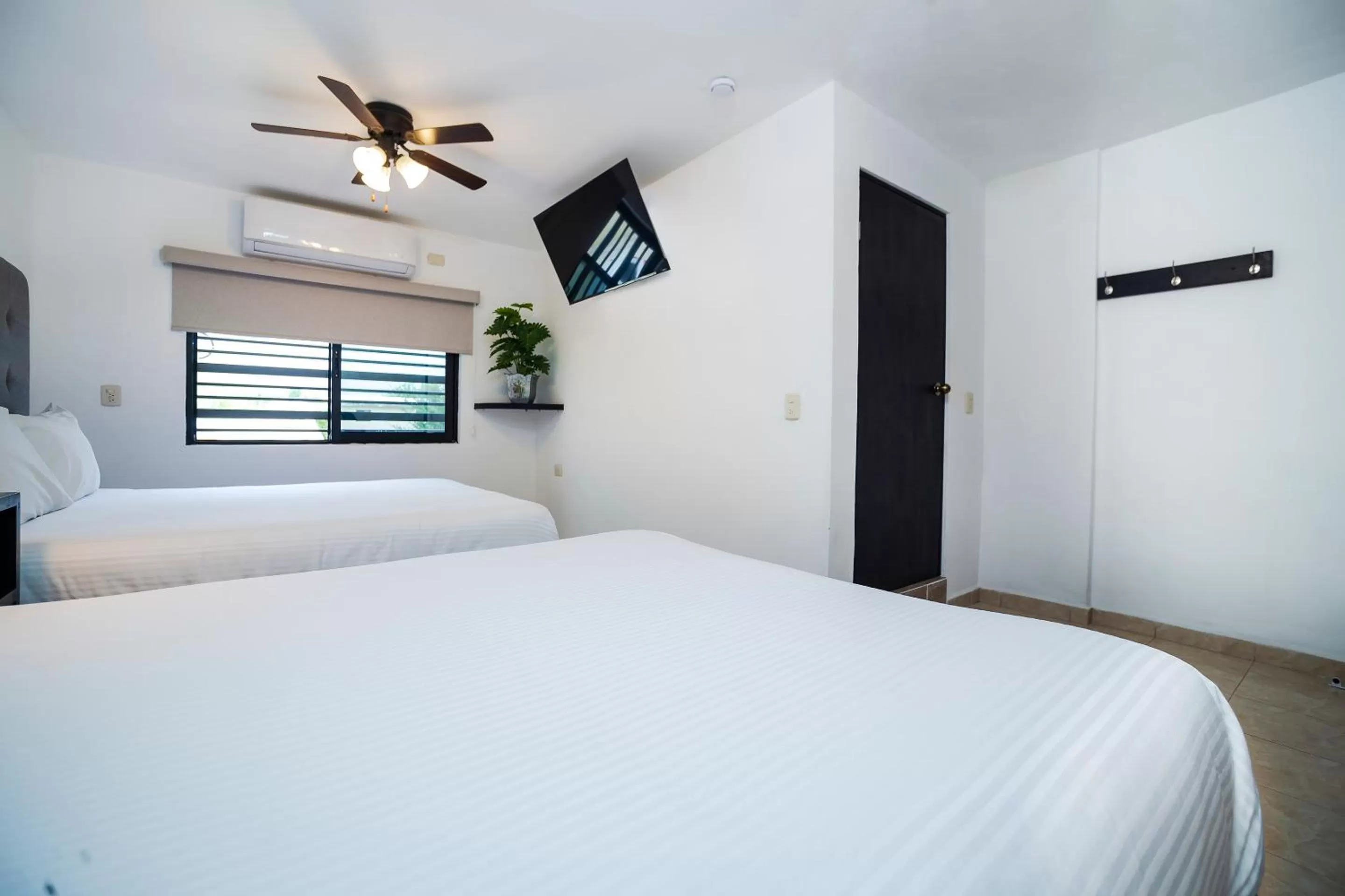 Bed in San José Suites Boutique