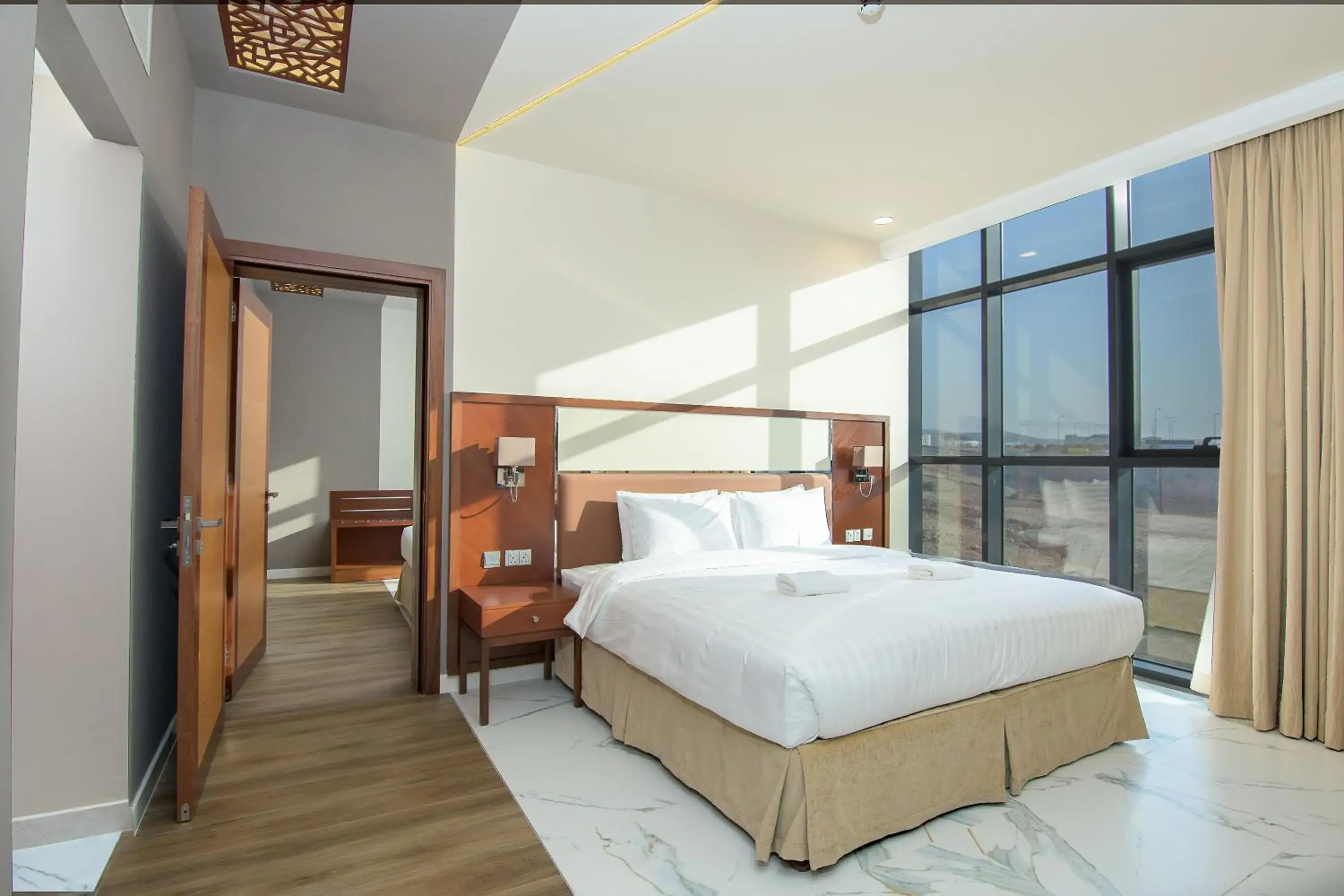 Photo of the whole room, Bed in Muscat Gate Hotel
