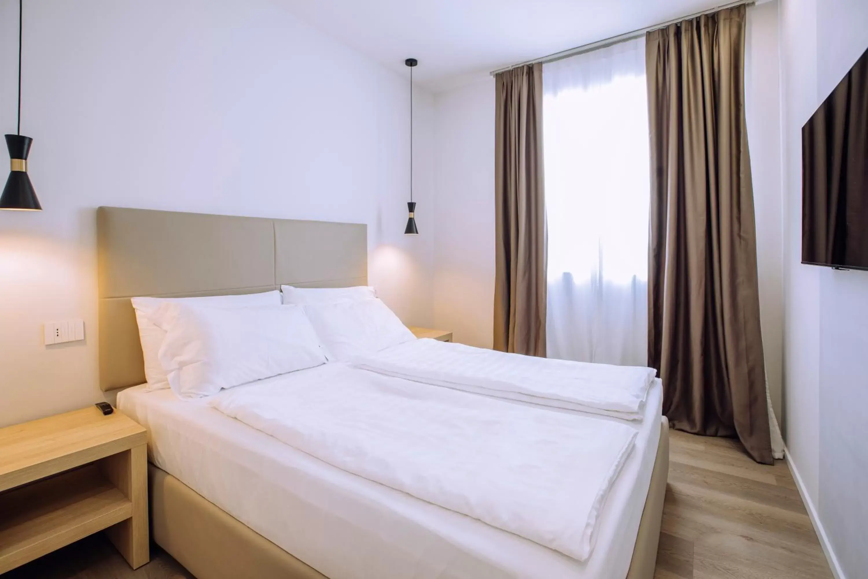 Bed in Ah Porticcioli Boutique Apartments