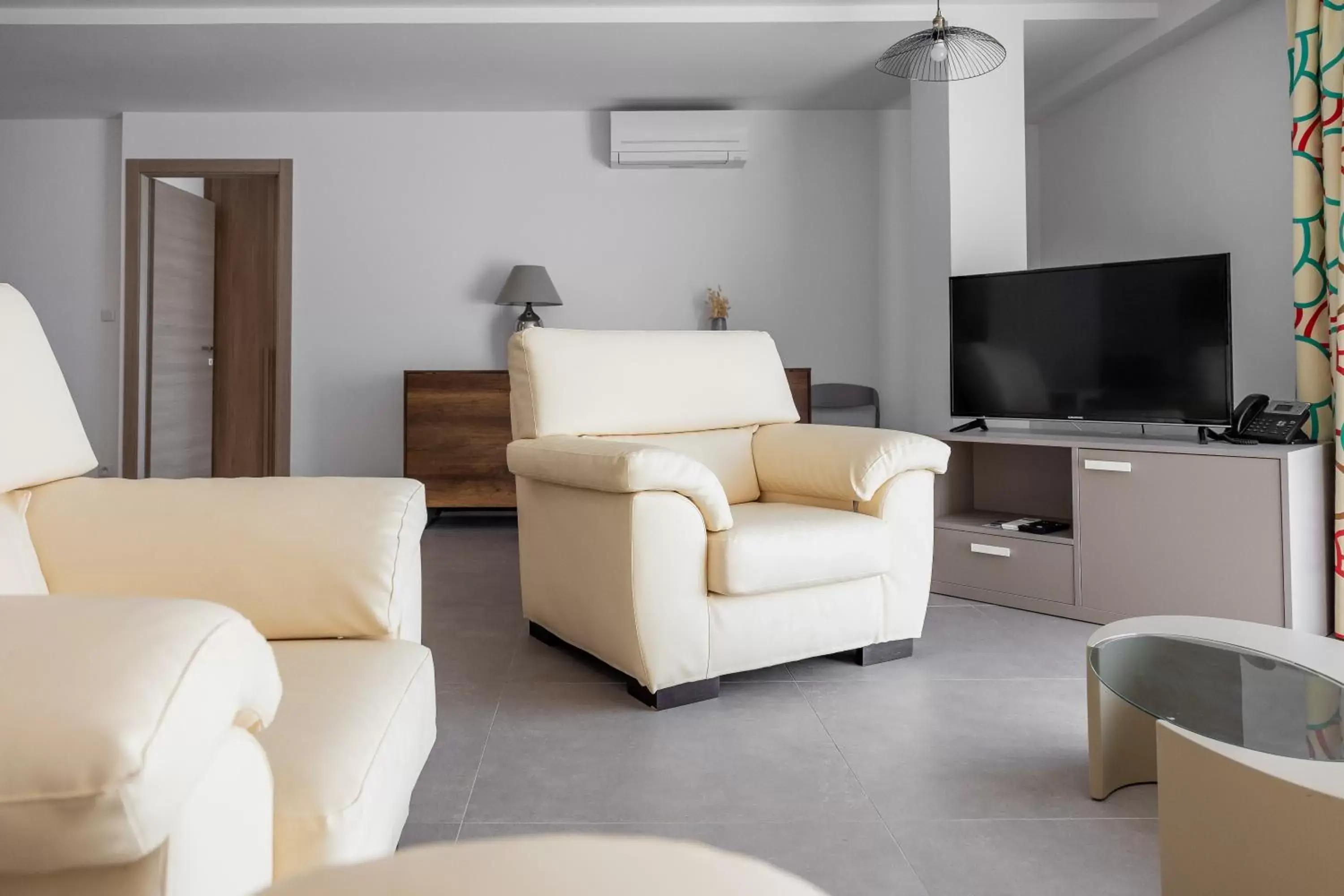 Communal lounge/ TV room, Seating Area in Hôtel Le Bastia