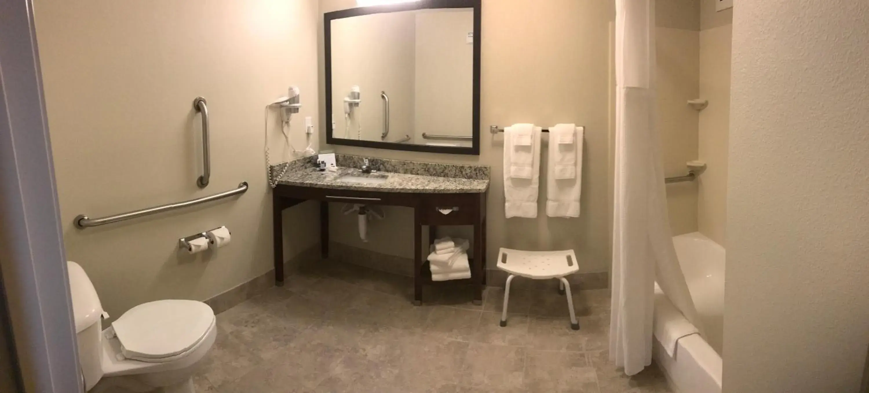 Bathroom in AmericInn by Wyndham Osage