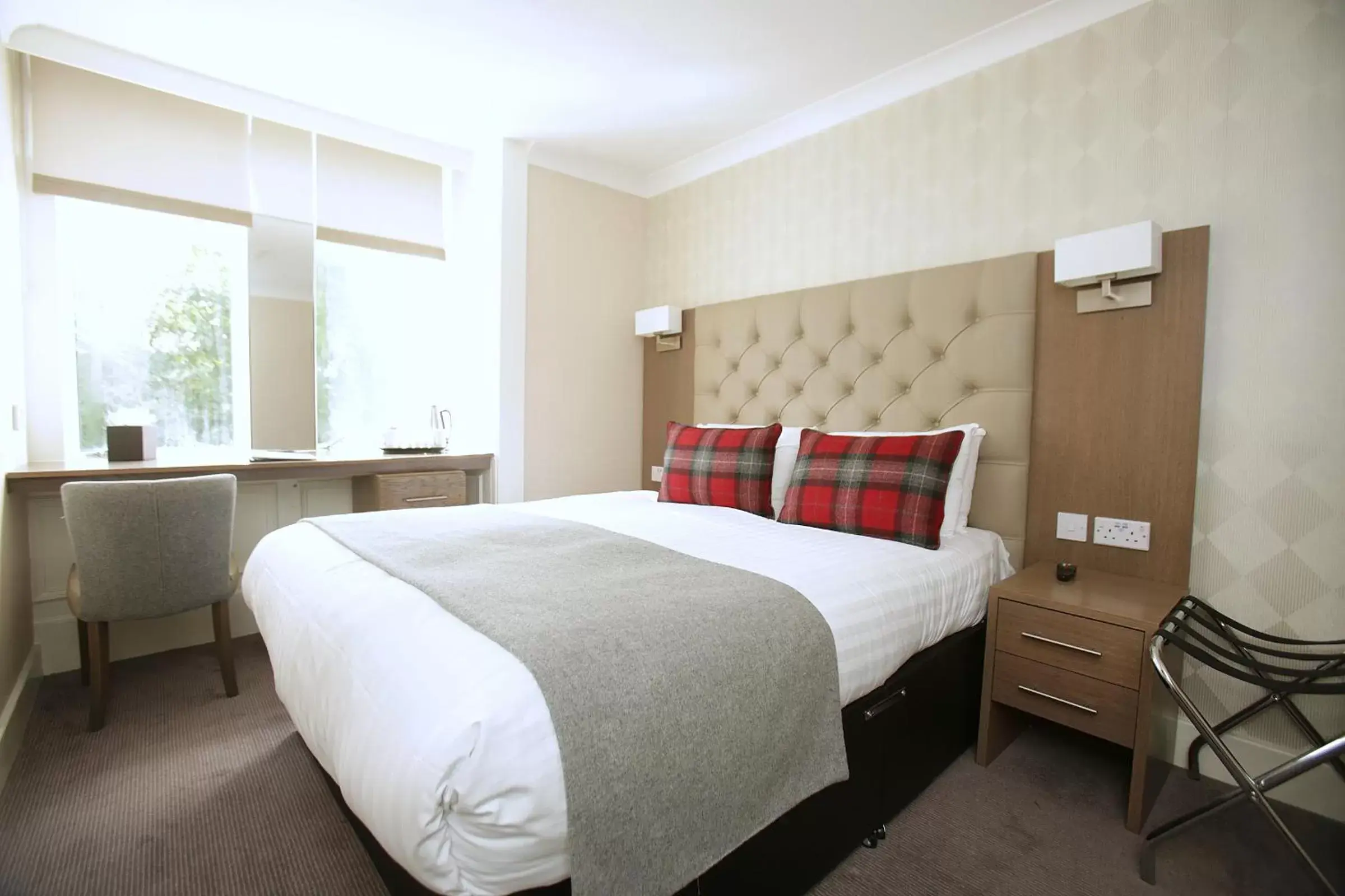 Bed, Room Photo in Ambassador Hotel