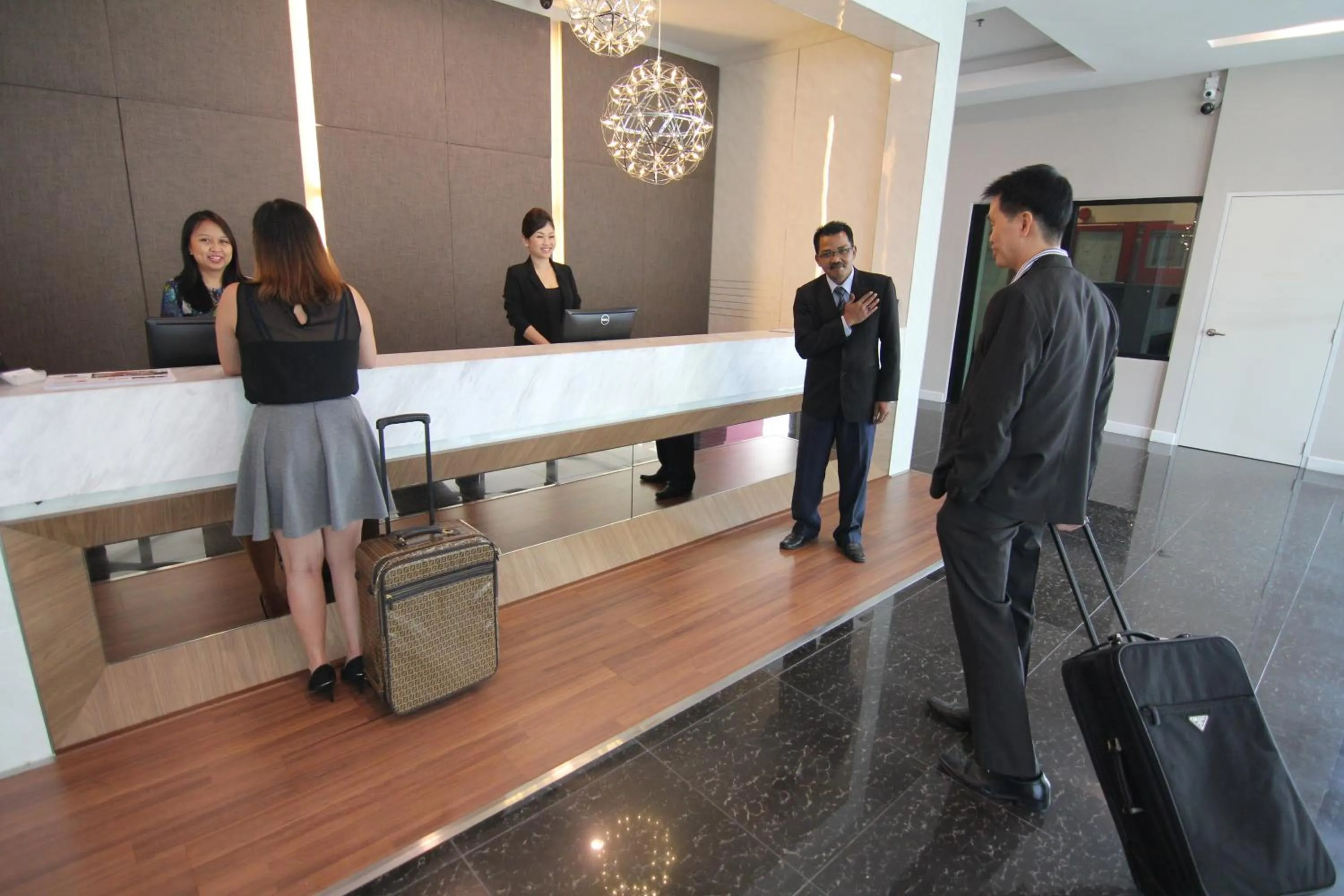 Staff in Nexus Regency Suites & Hotel