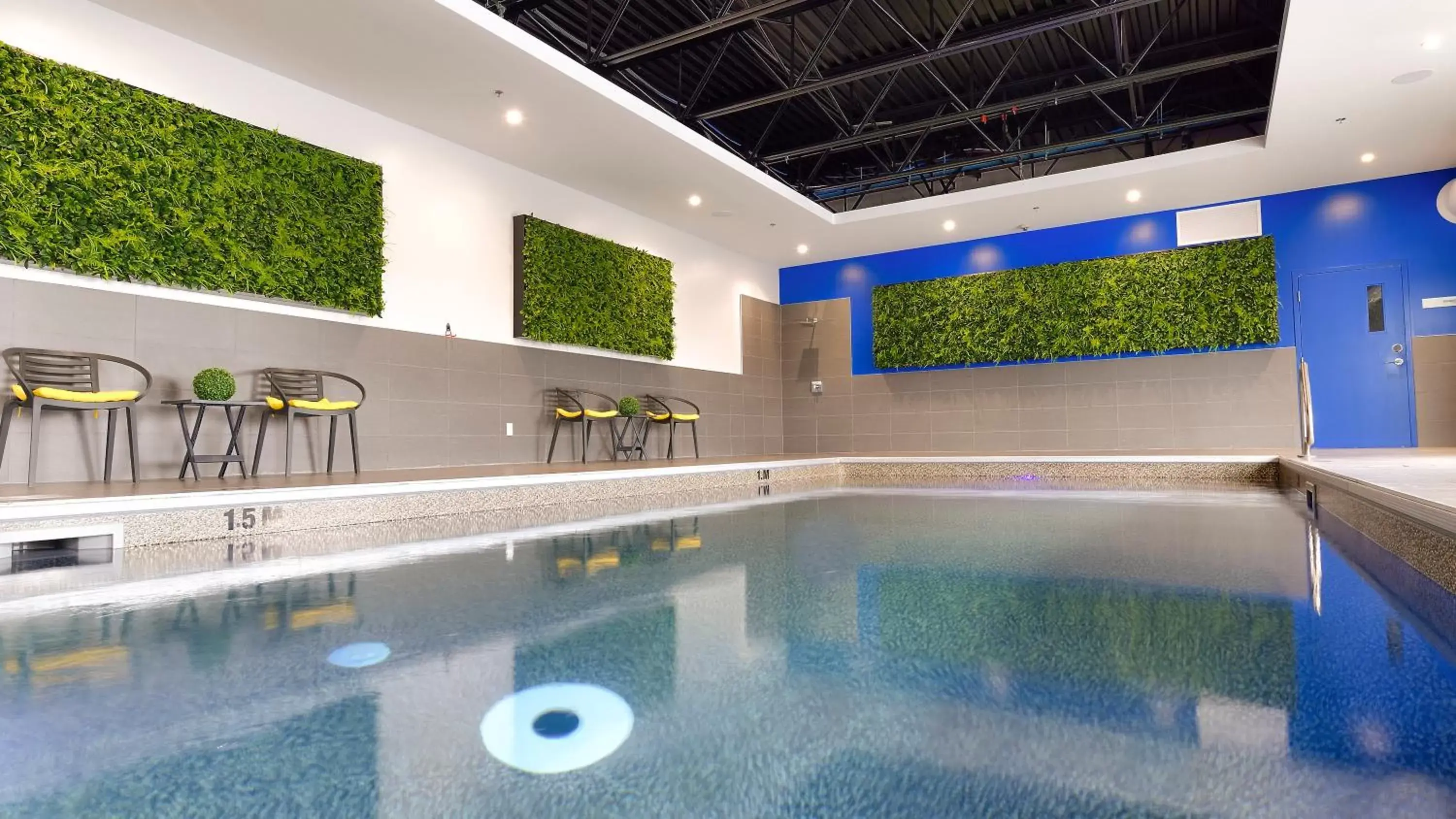 Swimming Pool in Holiday Inn Express & Suites Vaudreuil-Dorion, an IHG Hotel