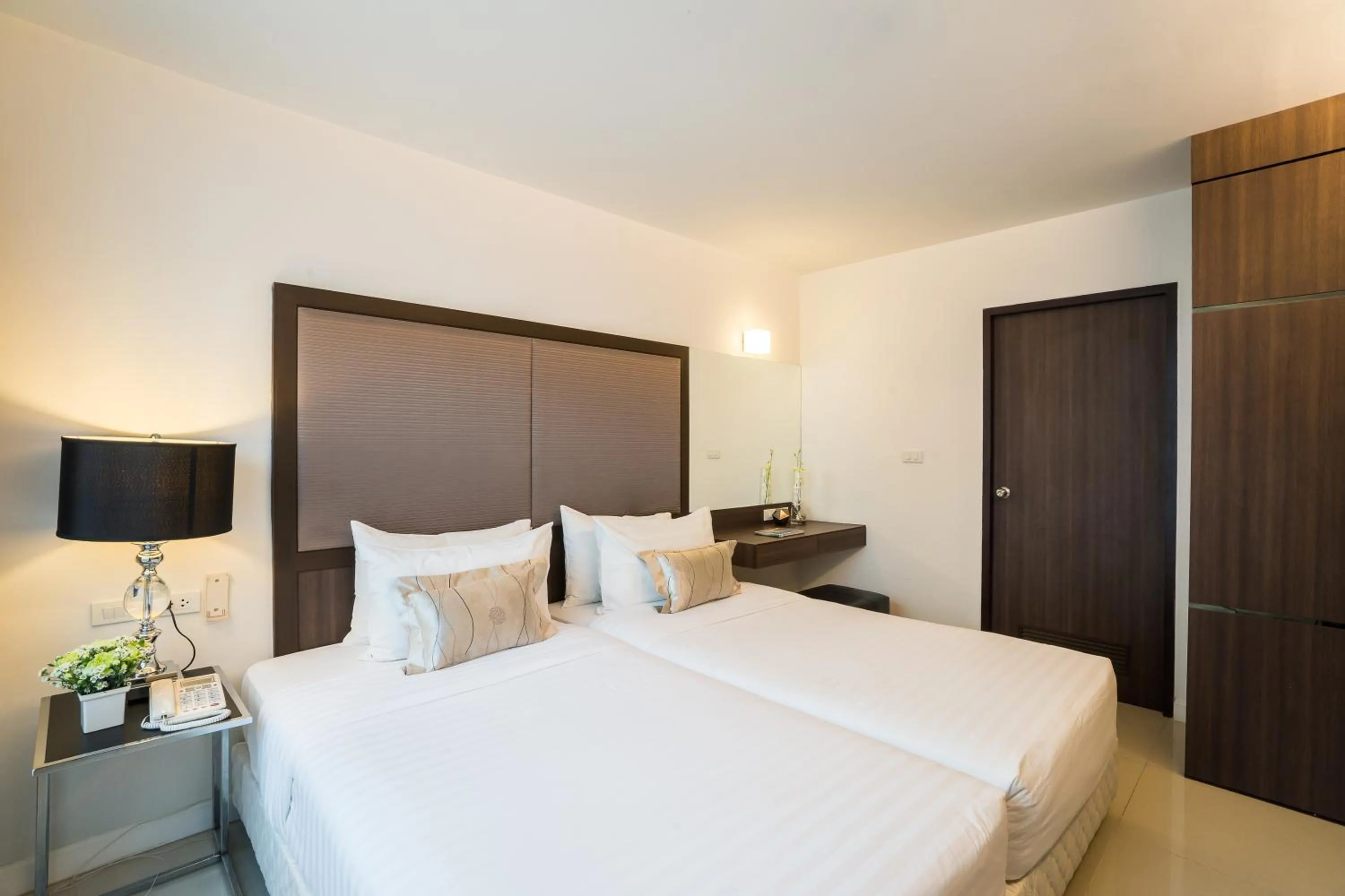 Photo of the whole room, Bed in Beyond Suite