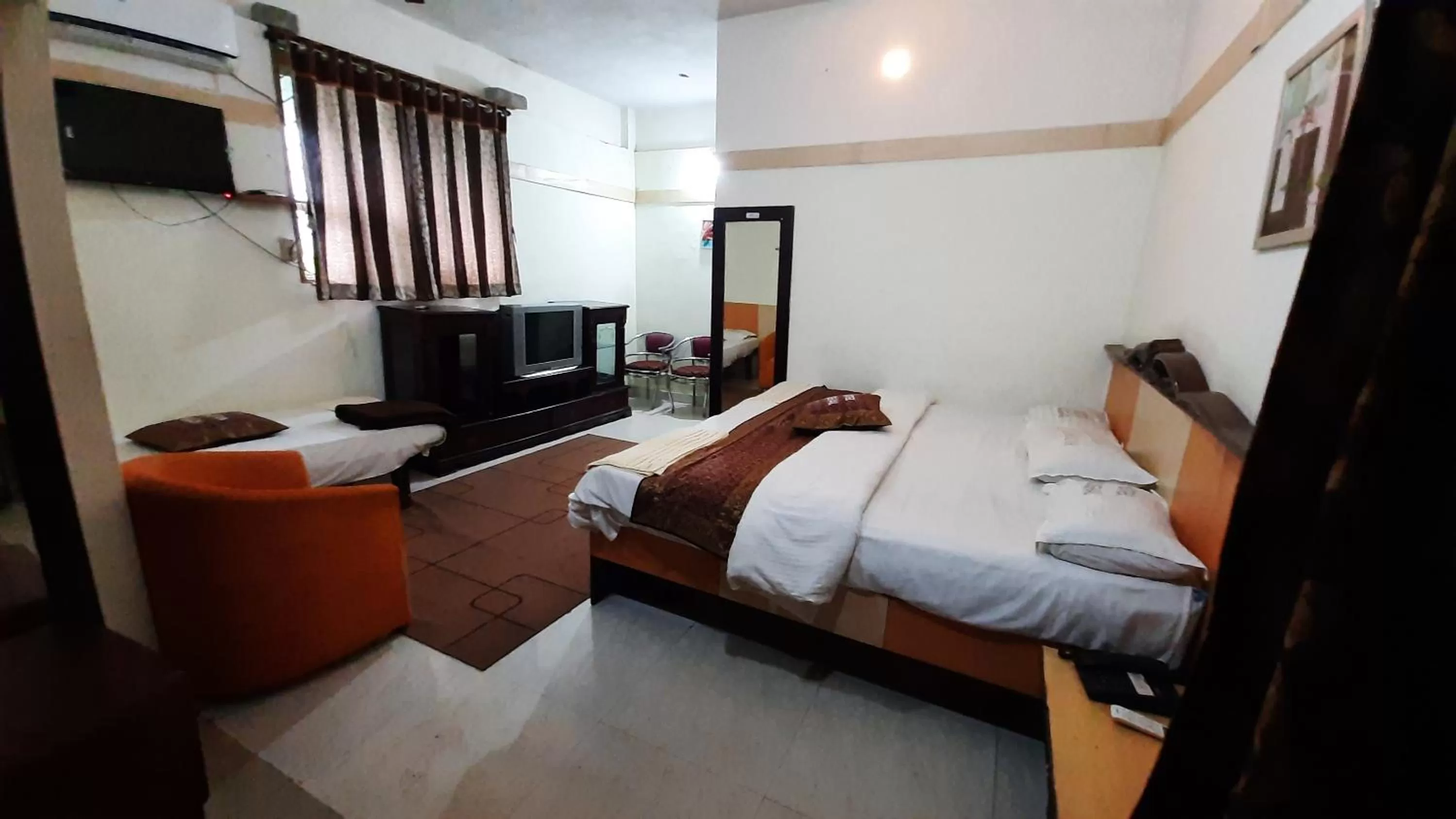 Photo of the whole room, Bed in Royal Mughal