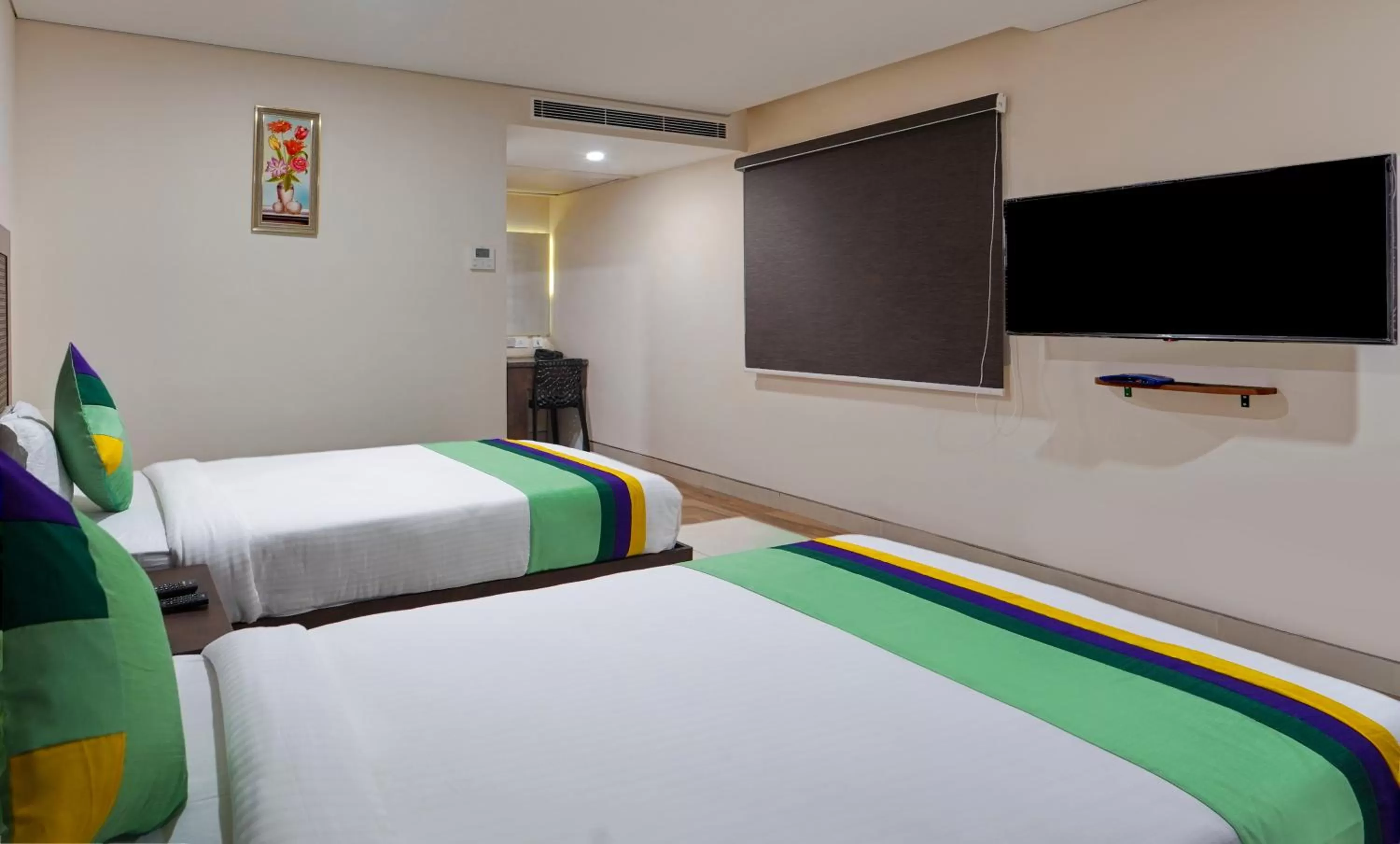 Bed in Treebo Vetri Supreme Residency