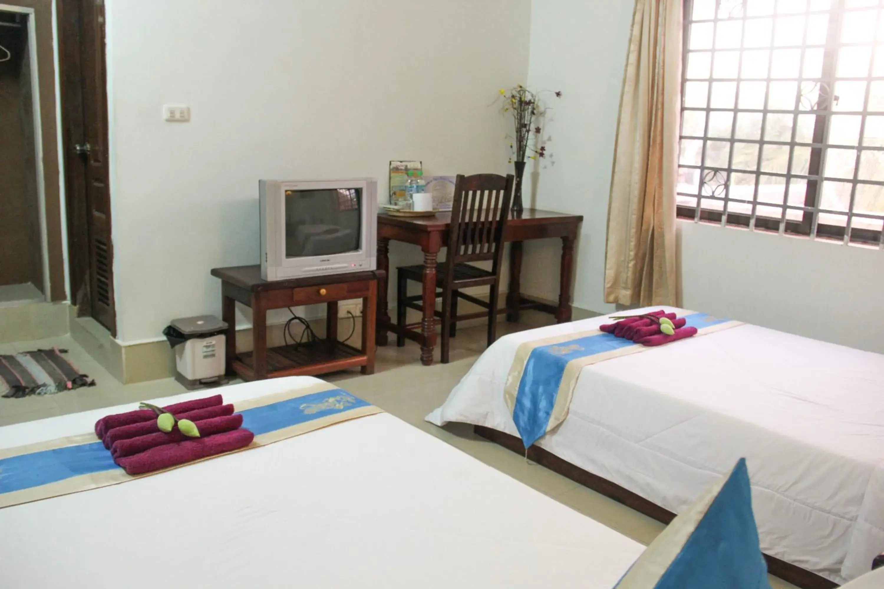 Bedroom, Bed in Tropical Breeze Guesthouse