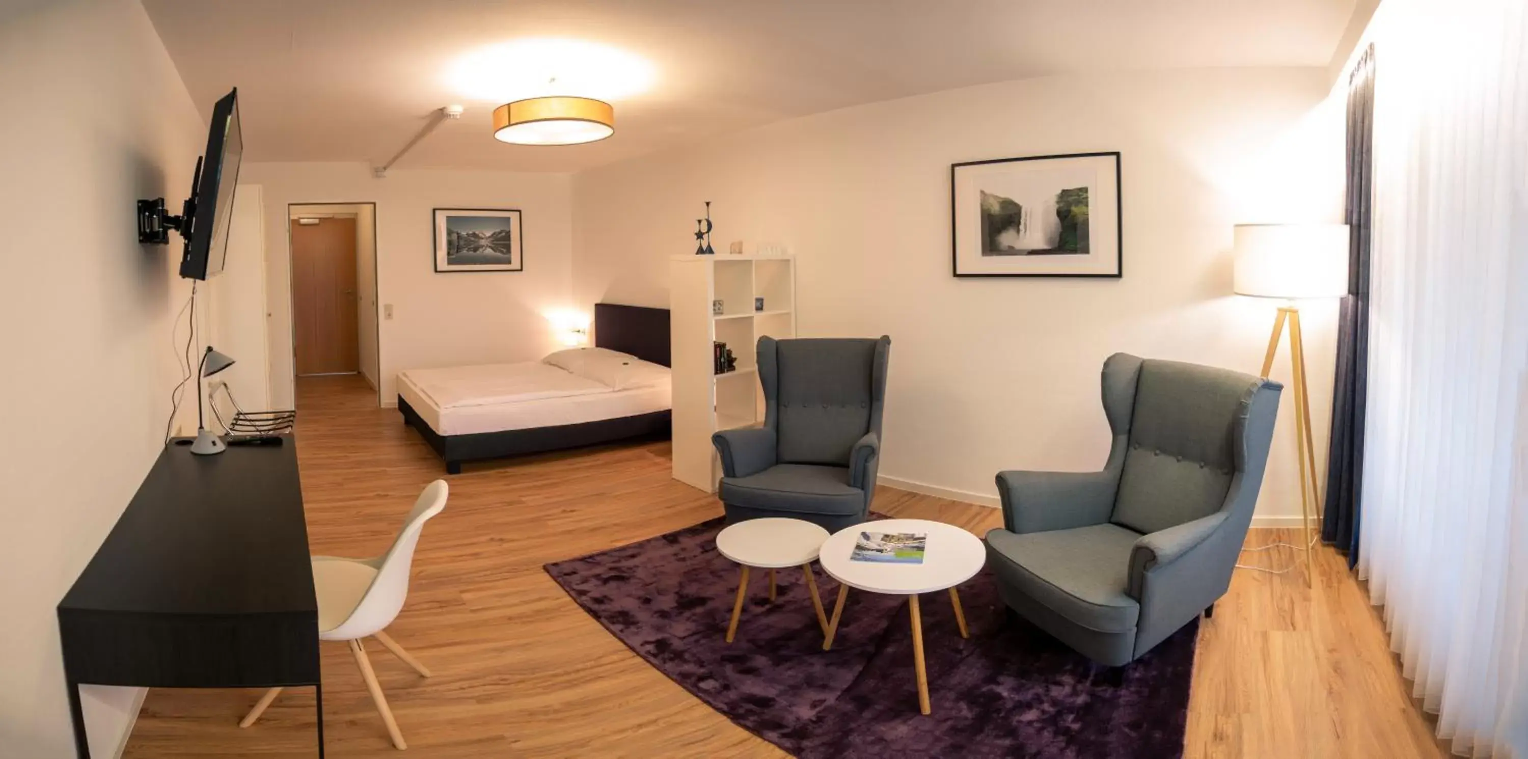 Bed, Seating Area in Hotel Quellenhof Bad Urach