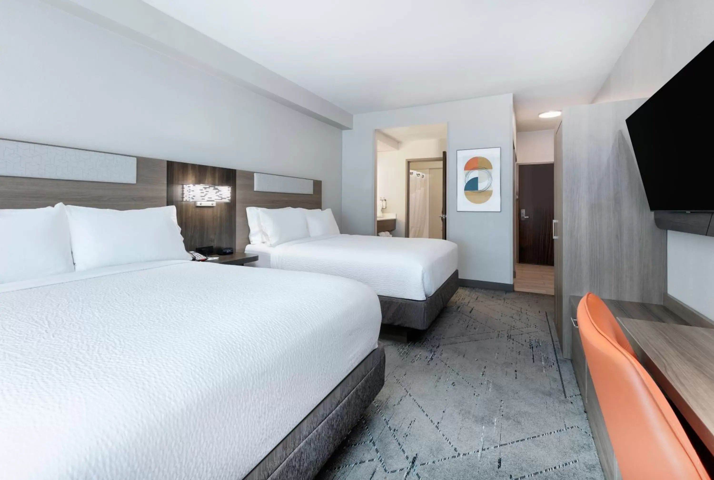 Bedroom, Bed in Holiday Inn Express & Suites - Dallas Park Central Northeast, an IHG Hotel