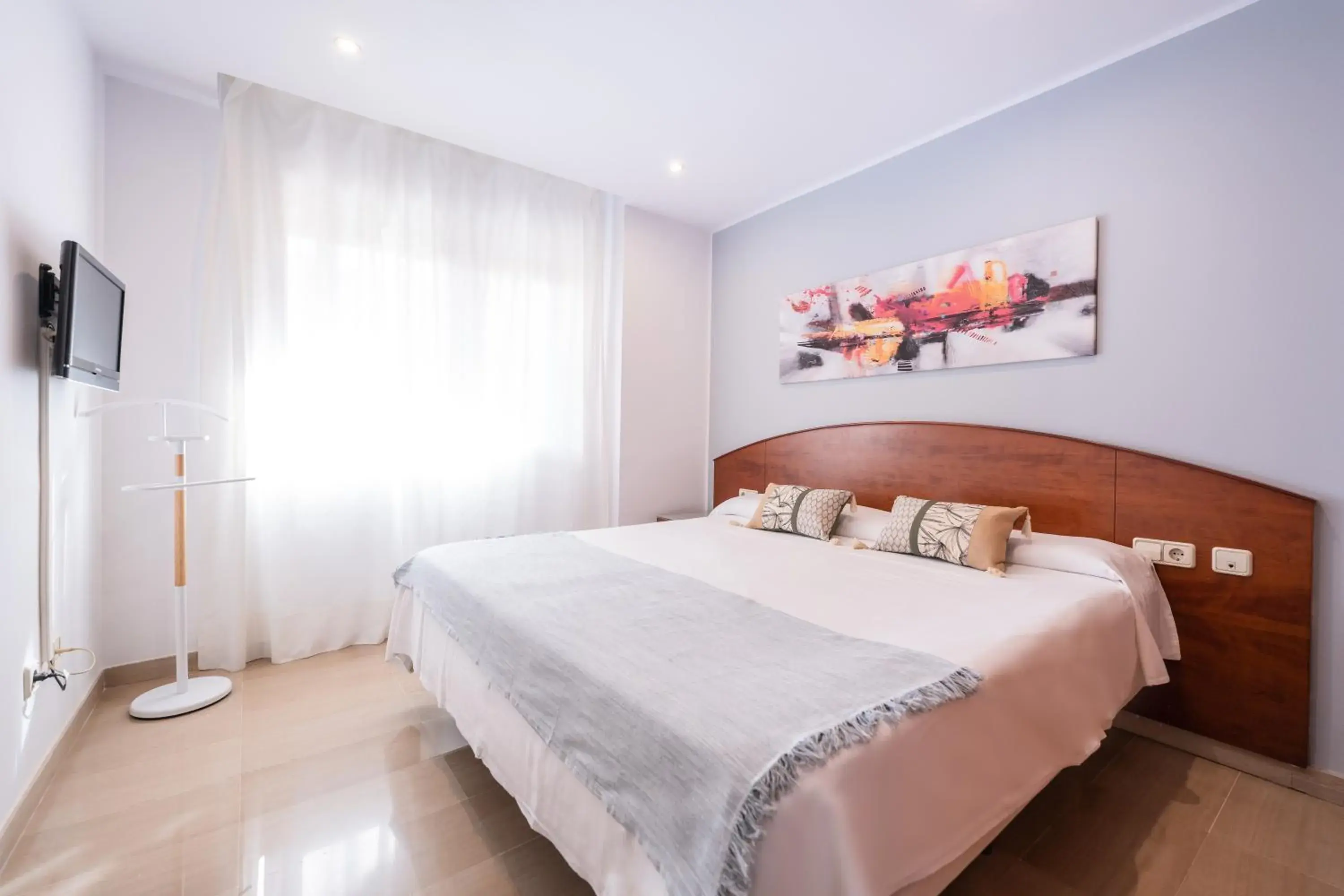 Bed in Aparthotel Napols - Abapart