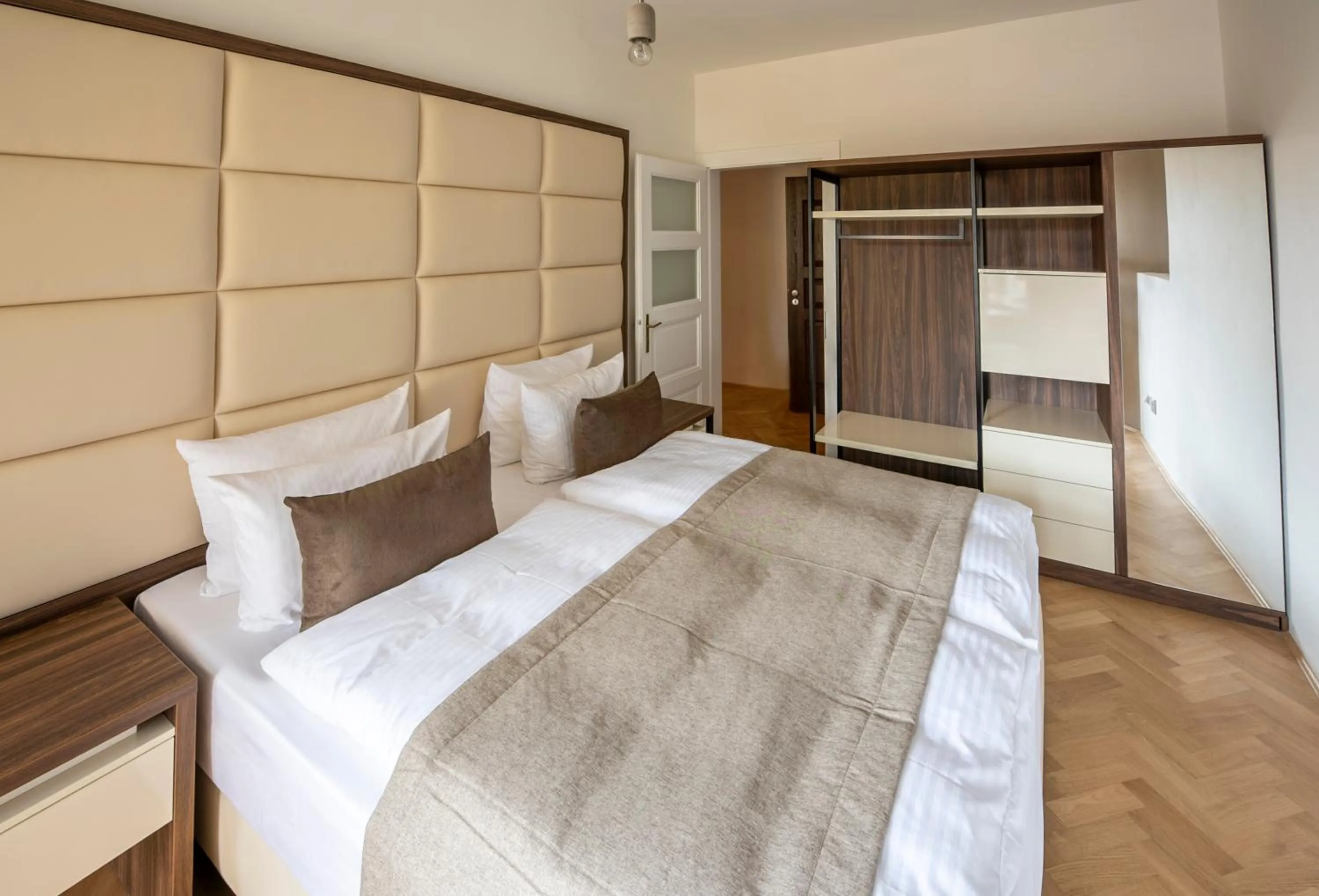 Bed in Letna Garden Suites