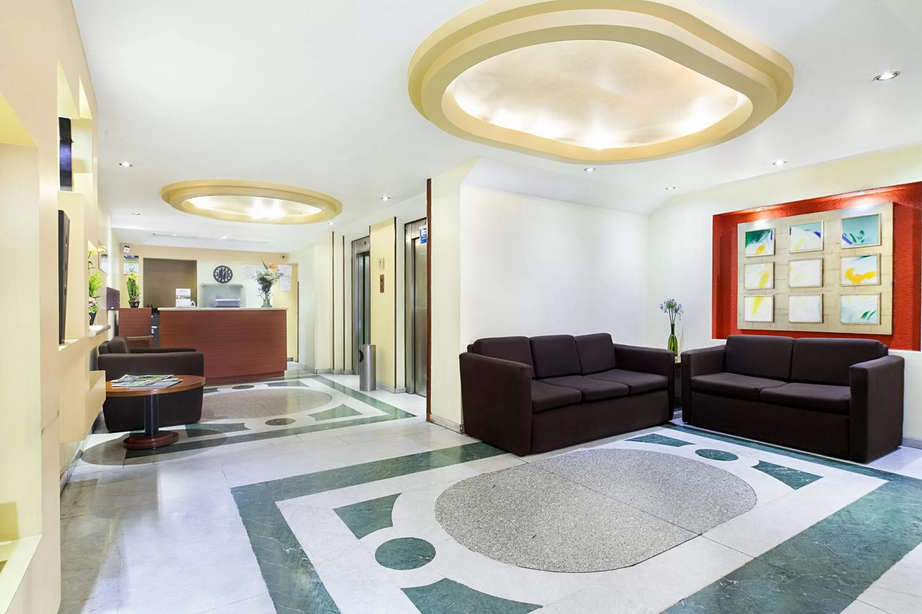 Lobby or reception in Exe Suites San Marino