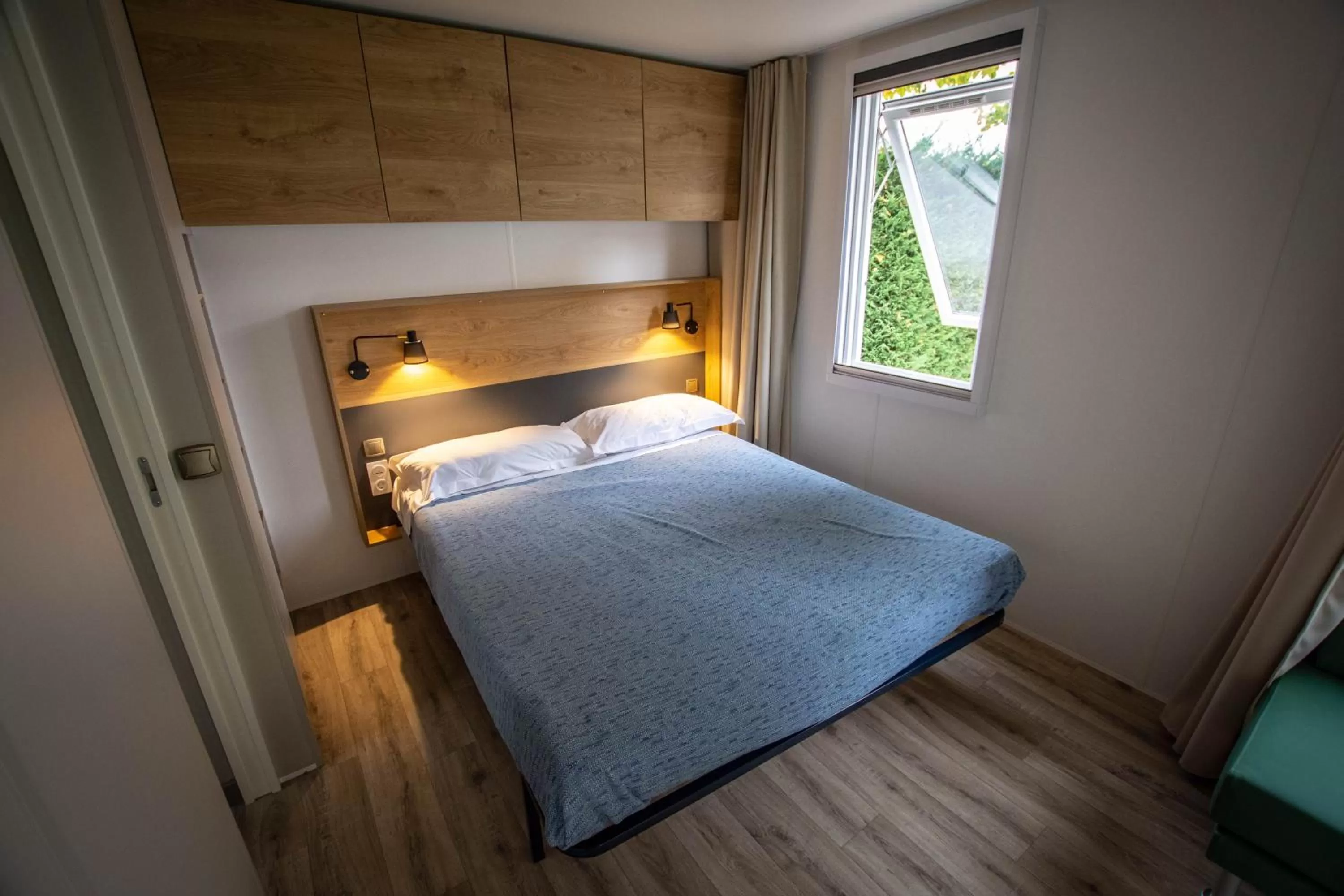 Bed in AgriCamping AlbaVillage Hotel & Wellness