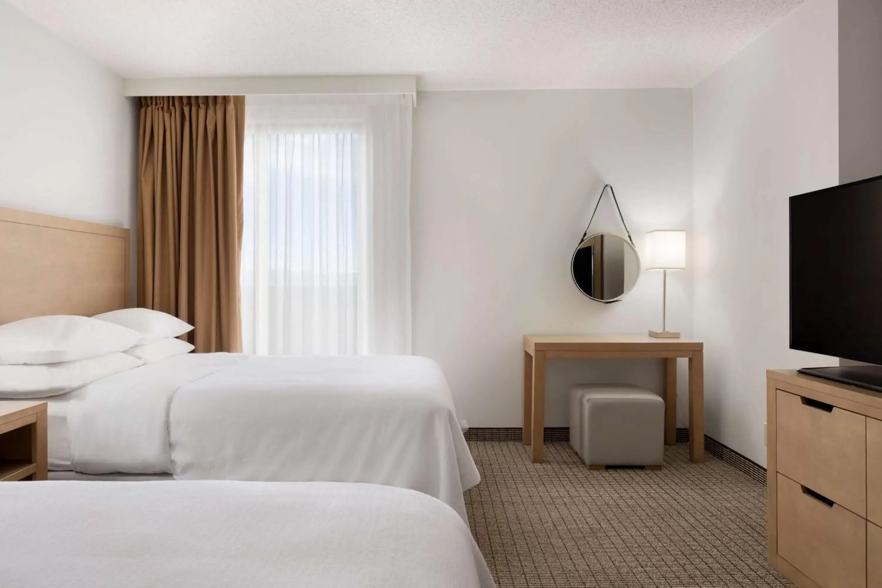 Bed in Embassy Suites by Hilton Denver International Airport