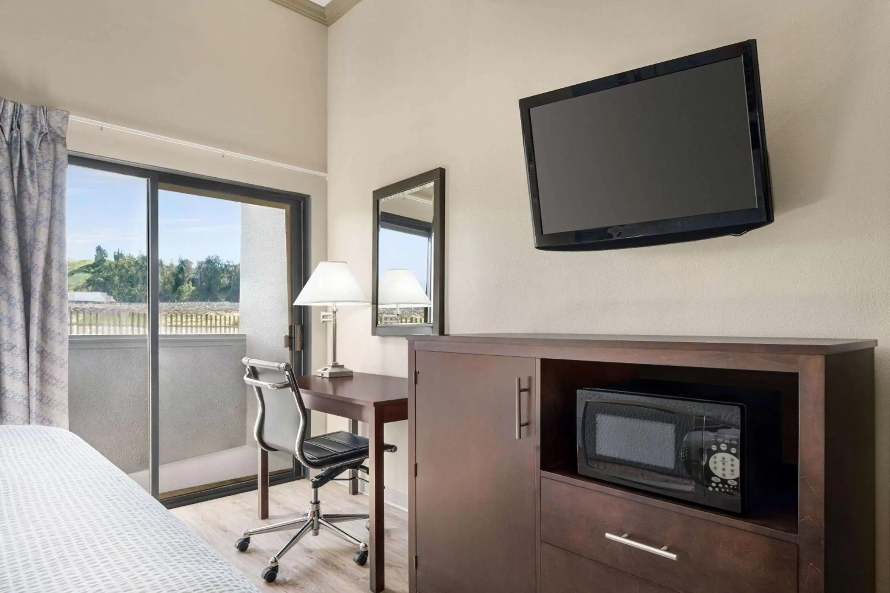 Photo of the whole room, TV/Entertainment Center in Baymont by Wyndham Monterey Park