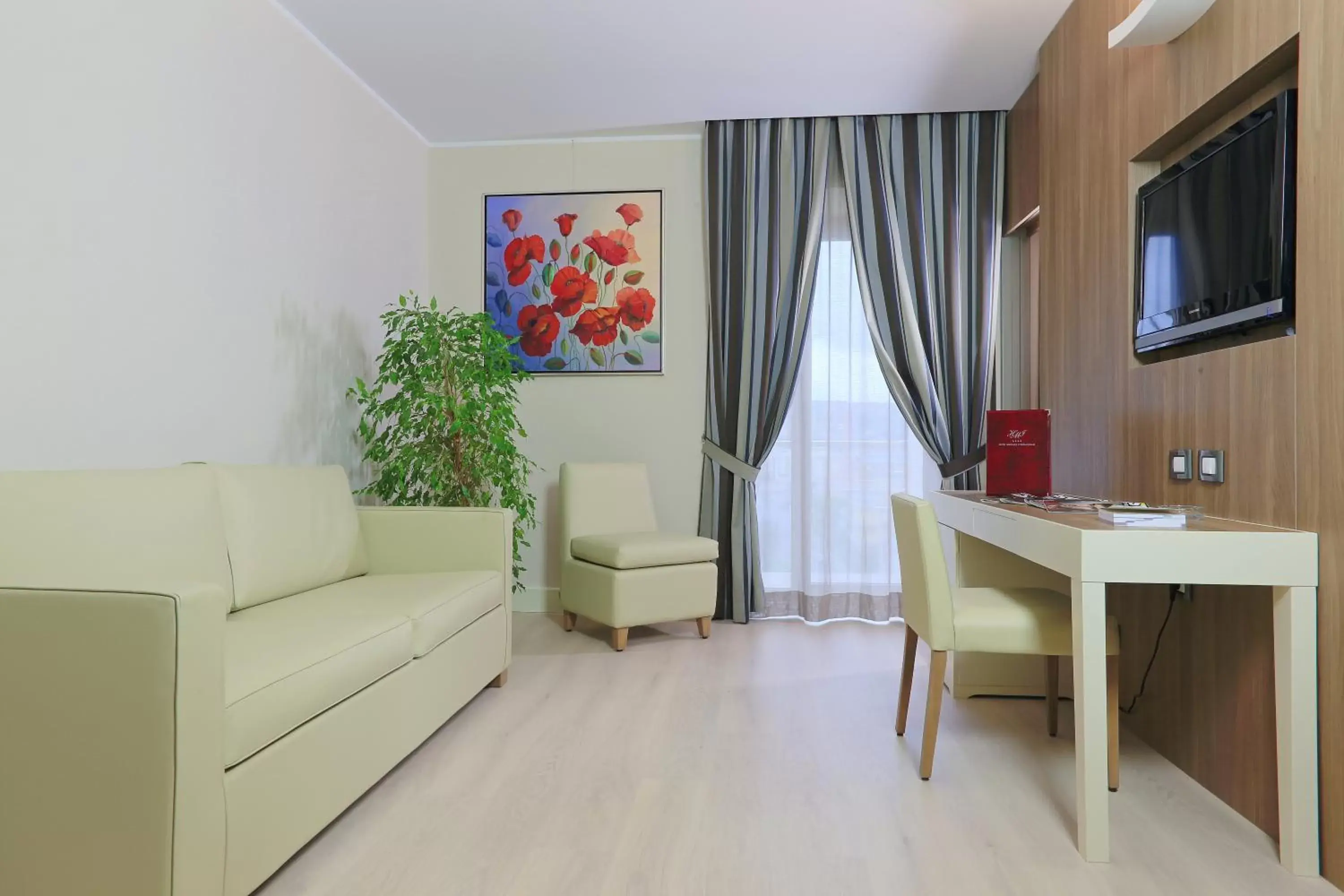 Living room, Seating Area in Hotel Mirasole International