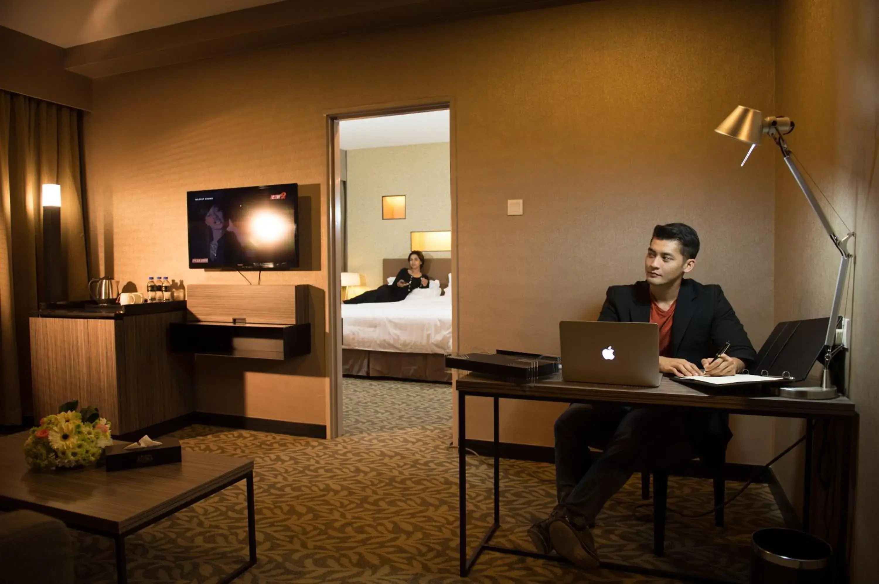 Living room, TV/Entertainment Center in Grand Alora Hotel