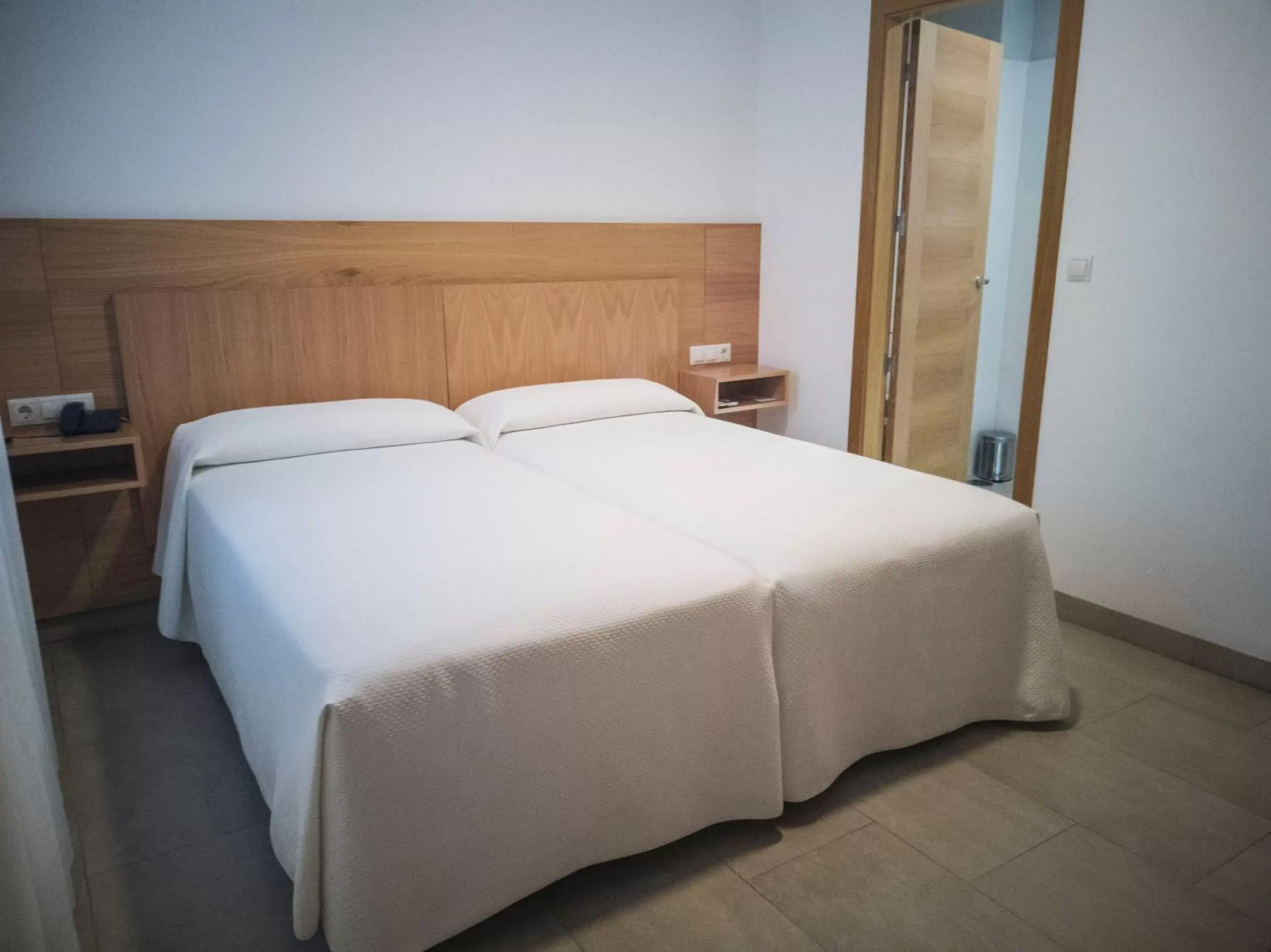 Bed in Hotel Abadi