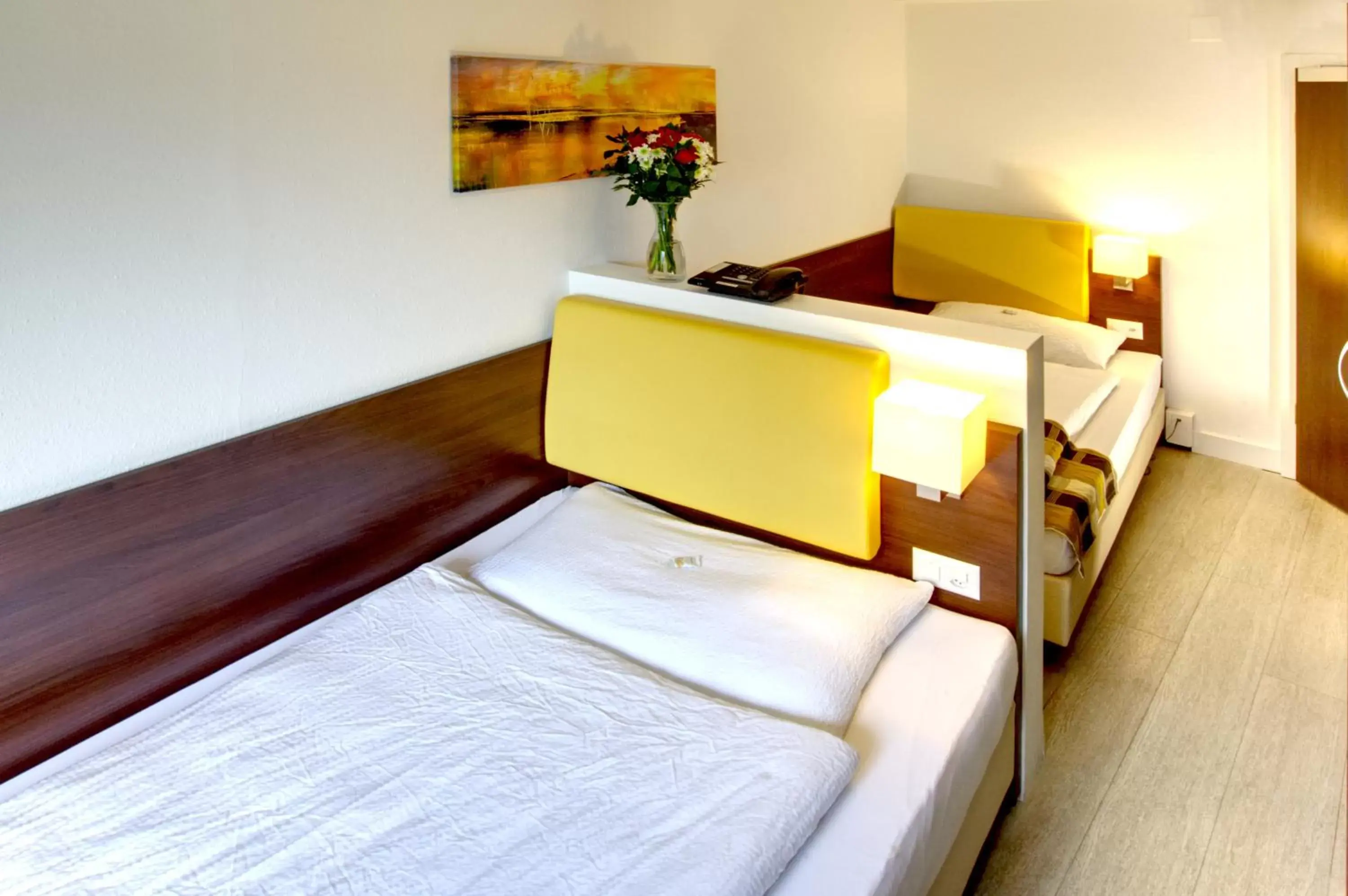 Bed in Hotel Rheinfelderhof