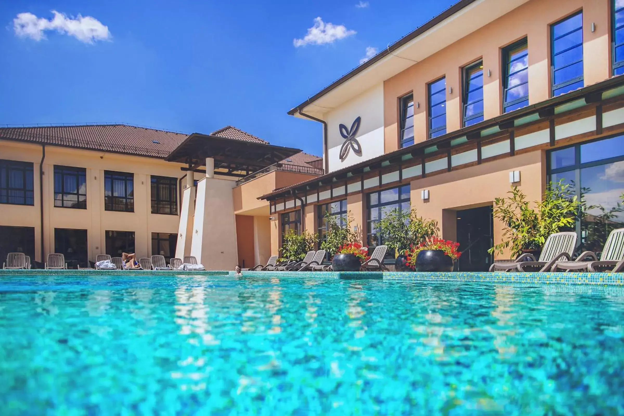 Swimming pool, Property Building in Caramell Premium Resort Superior