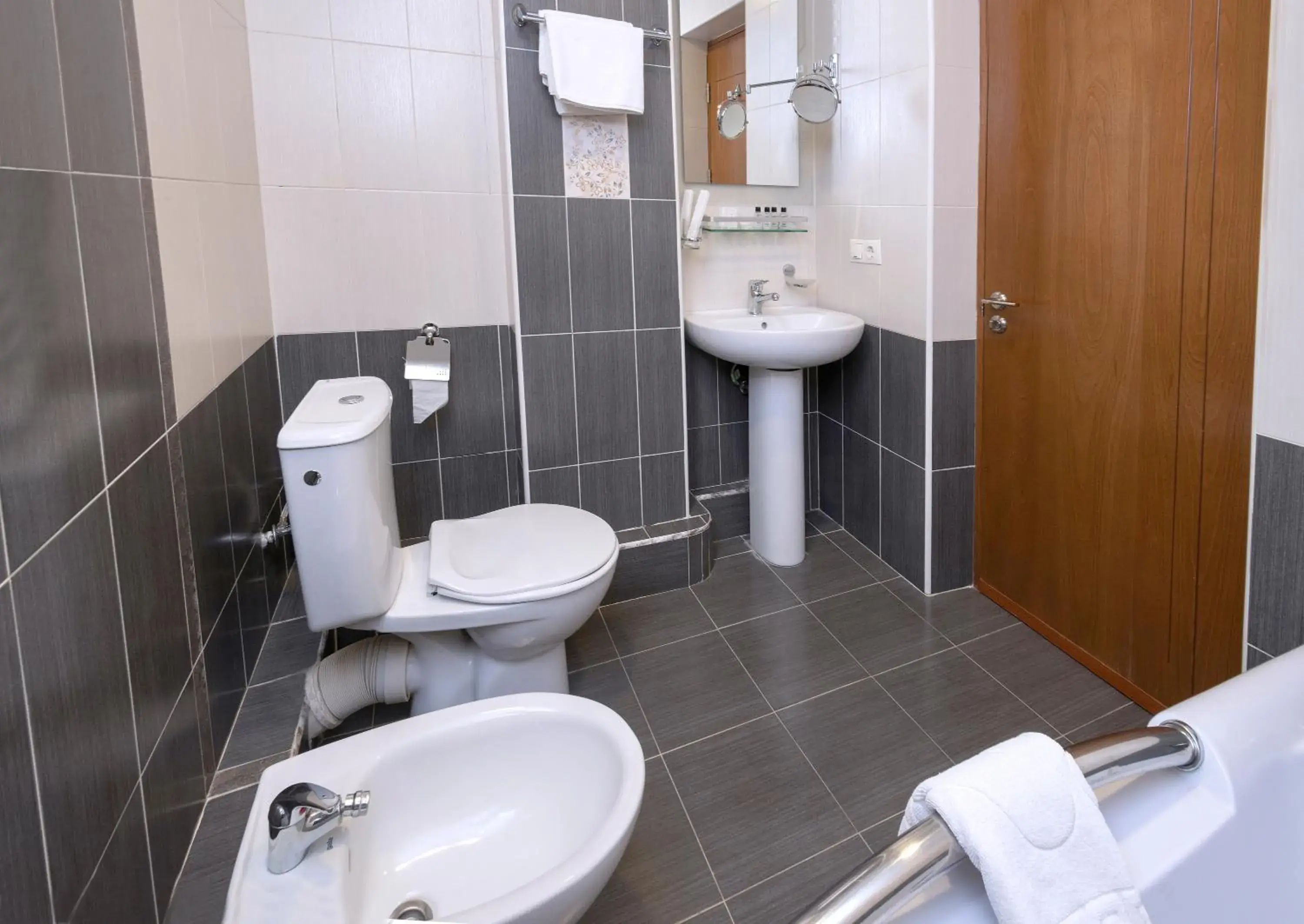 Toilet, Bathroom in Ani Central Inn