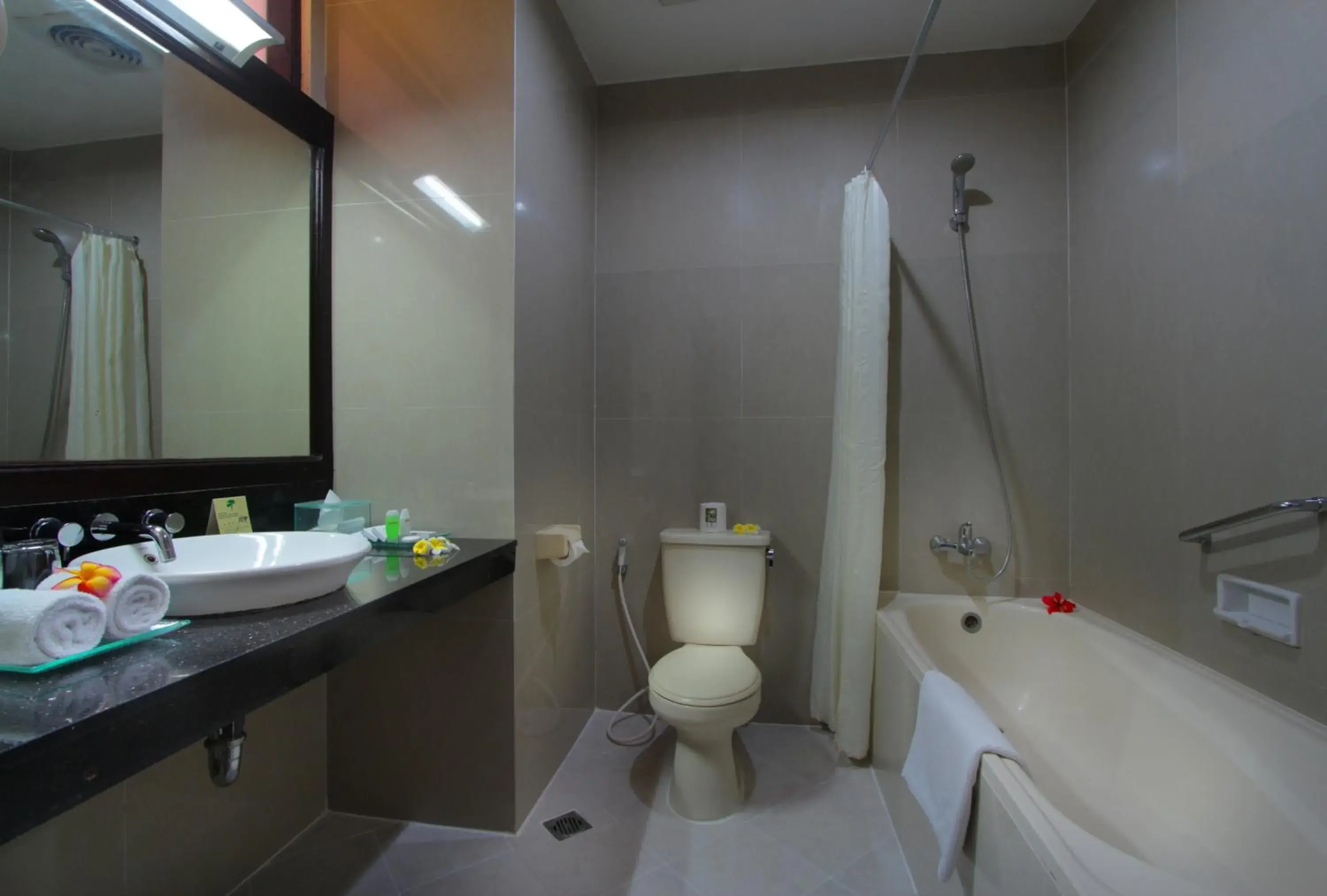 Bathroom in Adi Dharma Hotel Kuta