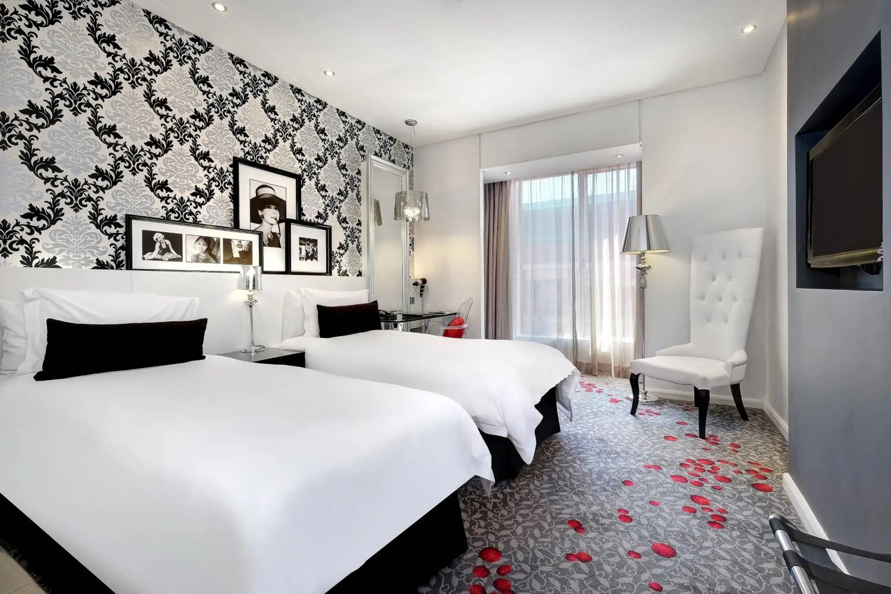 Photo of the whole room, Bed in Protea Hotel by Marriott Fire & Ice Johannesburg Melrose Arch