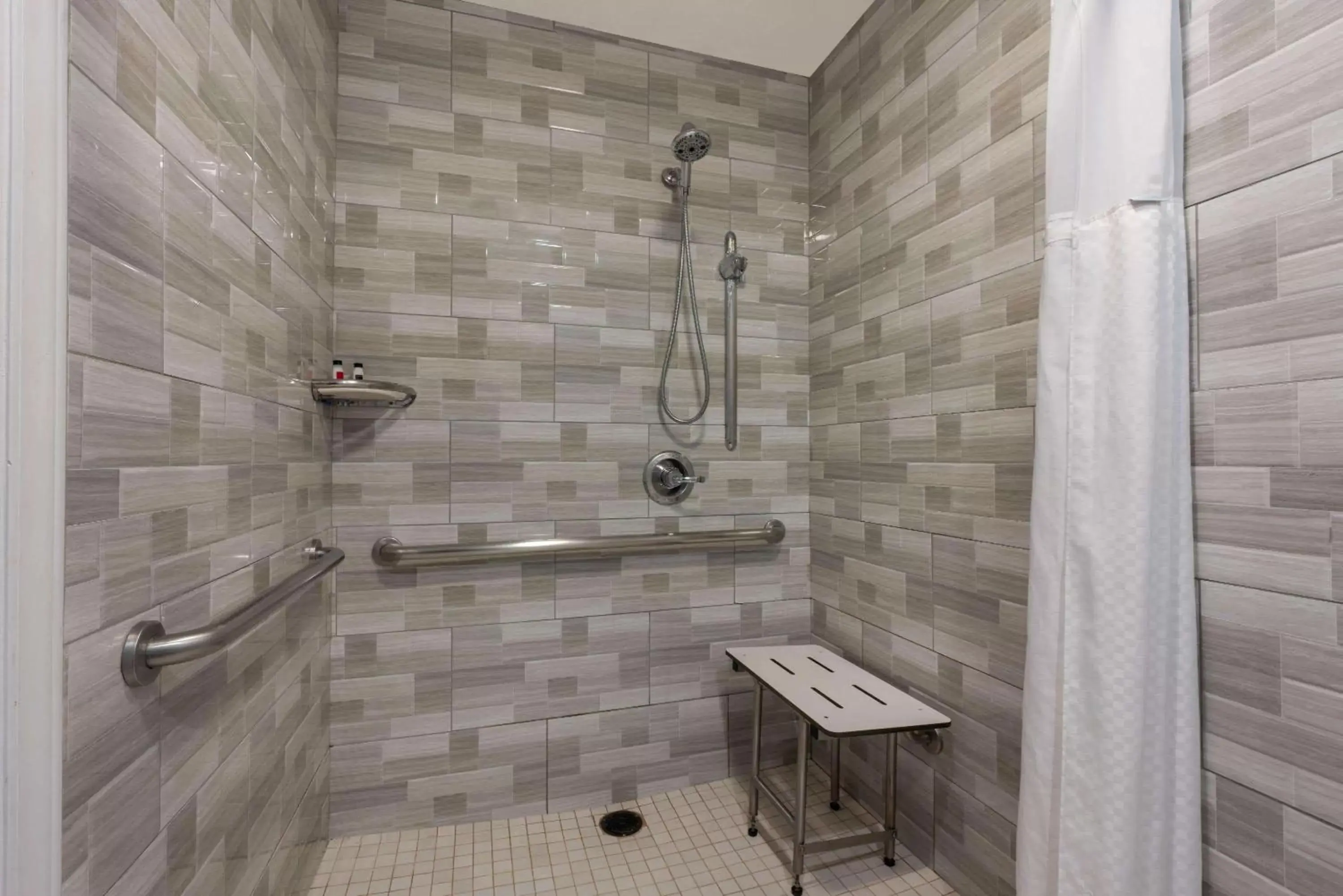 Bathroom in Super 8 by Wyndham San Bruno /SF Intl Arpt West