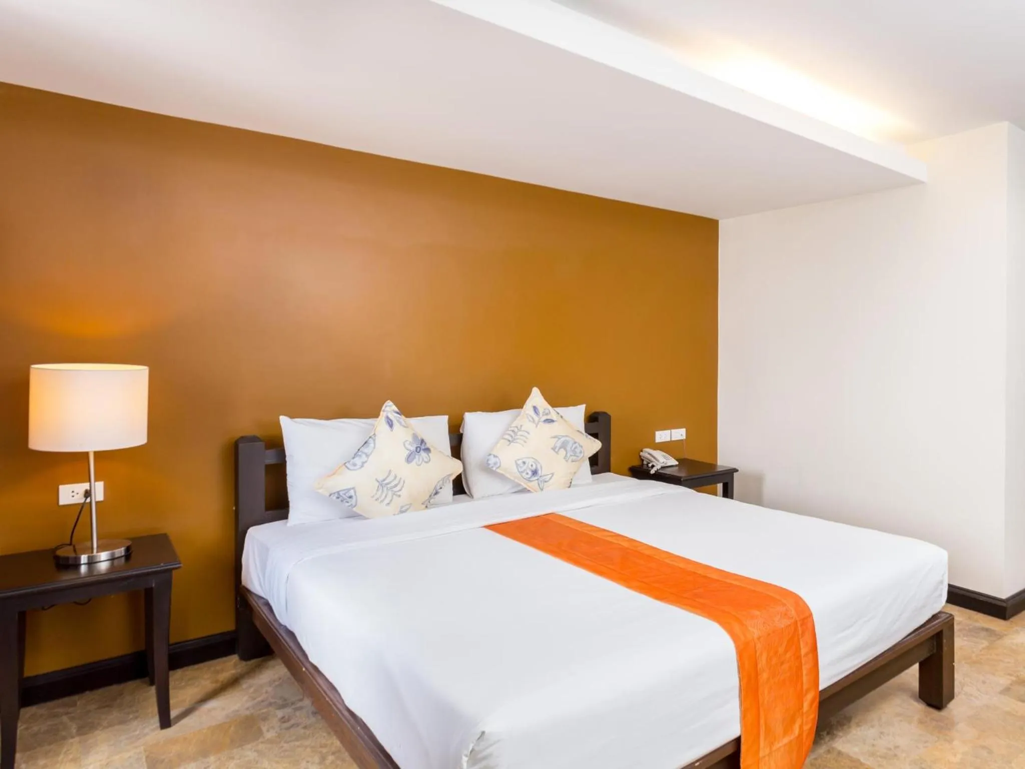 Bed in All Together Suite Hotel