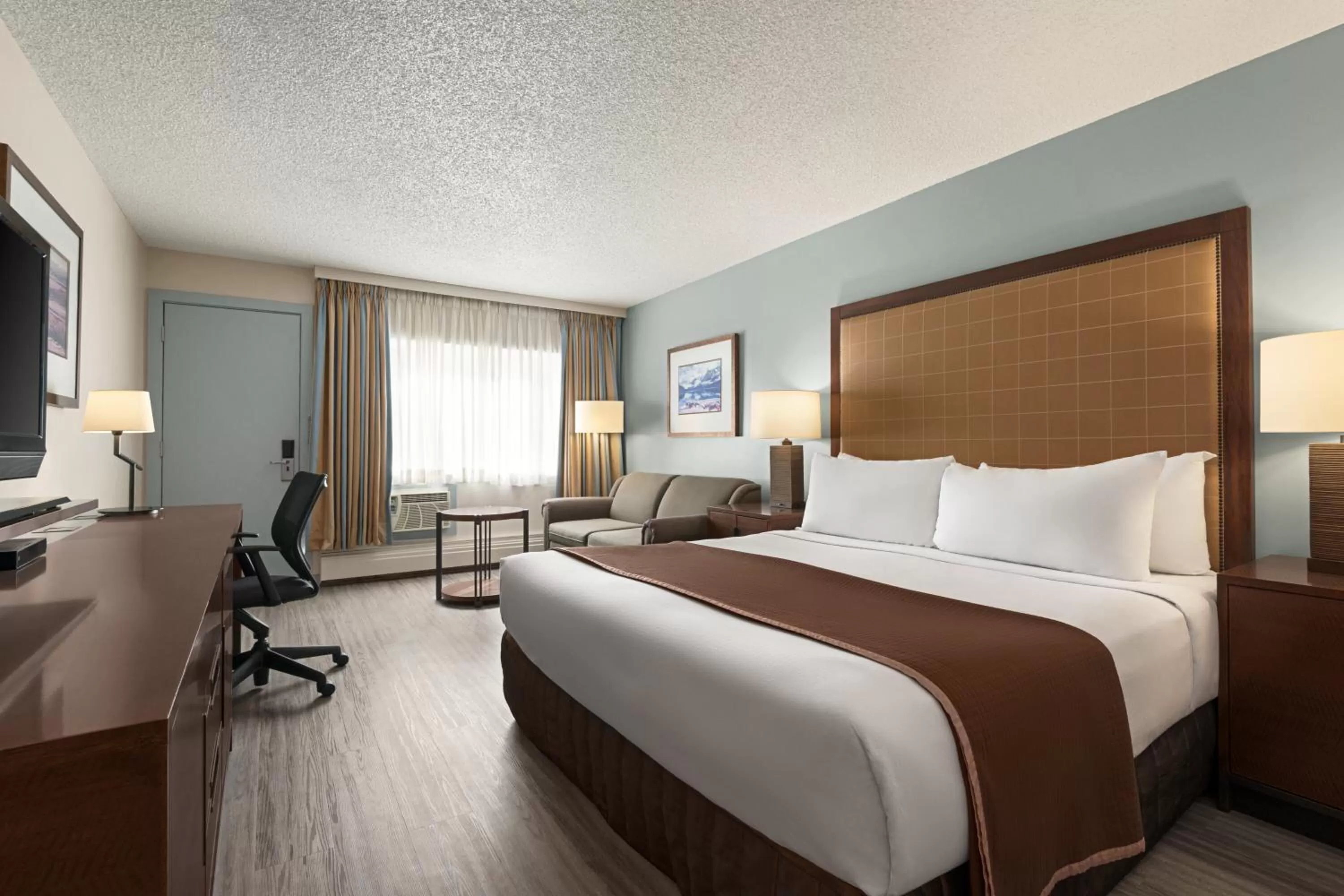 Bedroom in Travelodge by Wyndham Calgary South