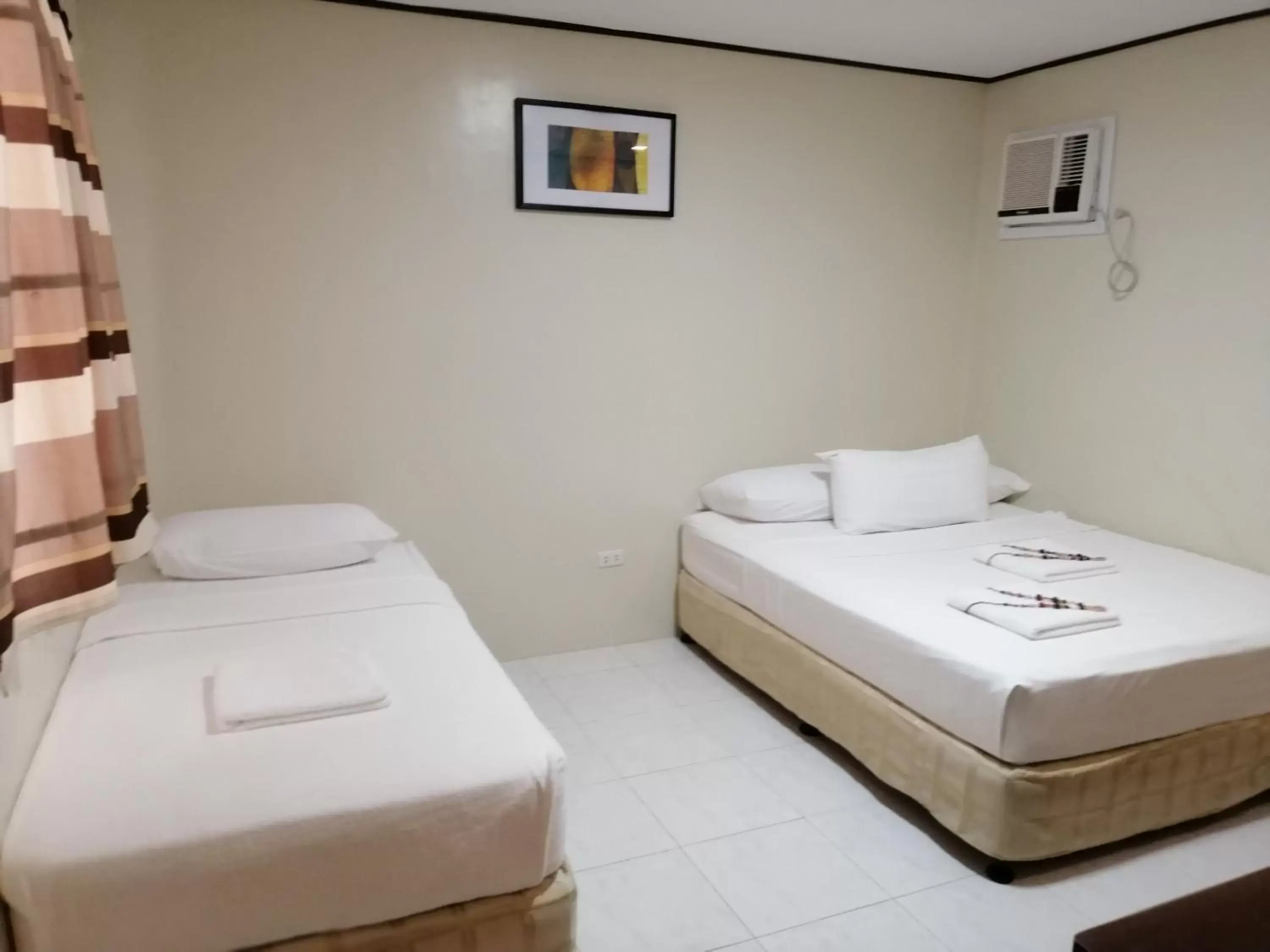 Bed in Anika Island Resort