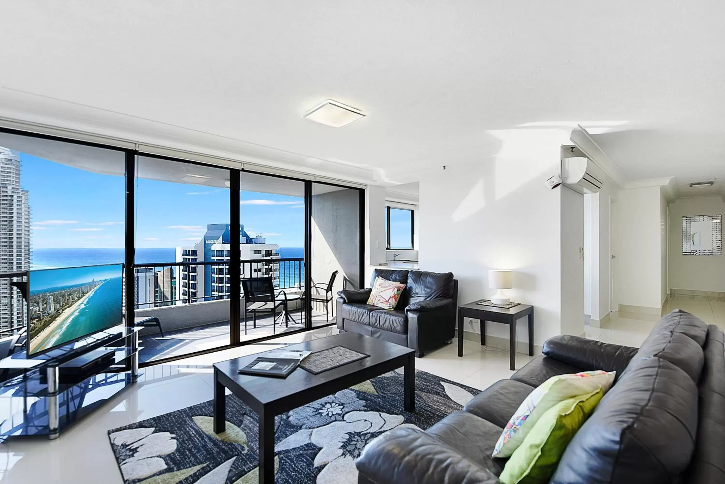 Living room, Seating Area in Surfers Century Oceanside Apartments