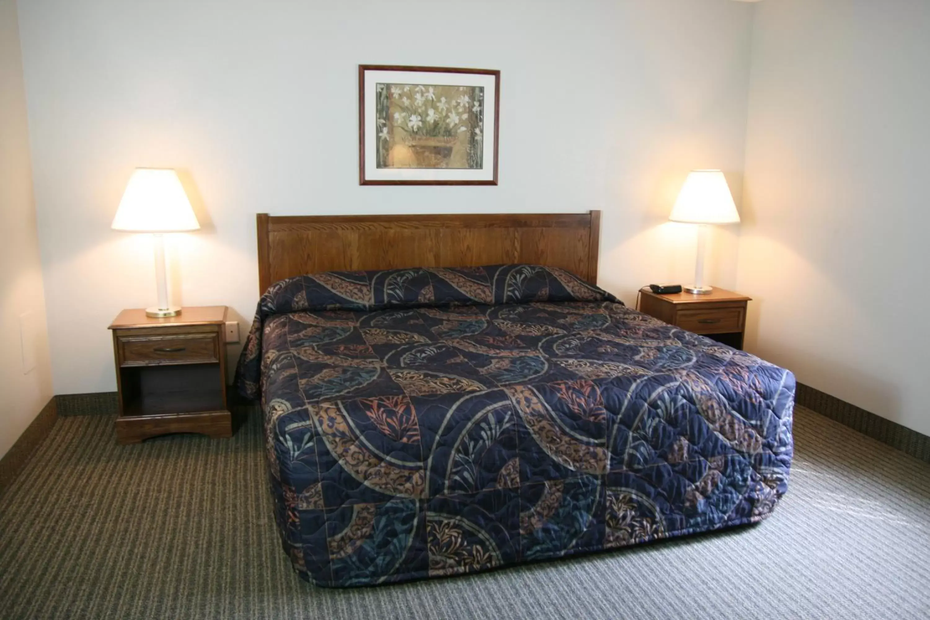 Bed in Affordable Suites Greenville