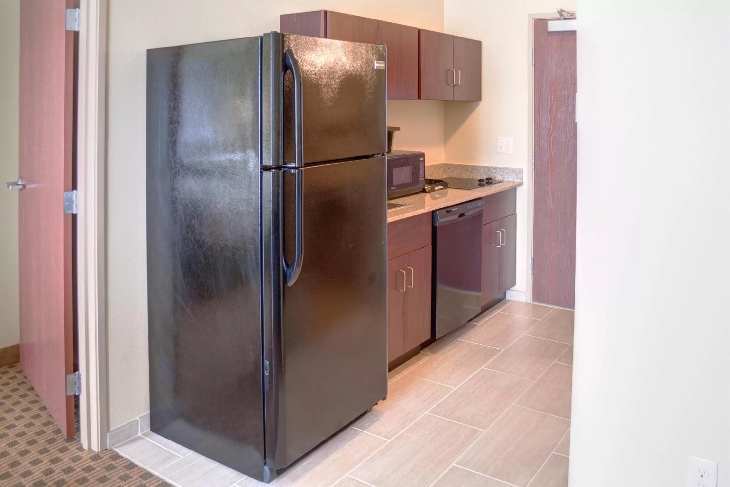 Kitchen or kitchenette in Cobblestone Hotel and Suites - Jefferson