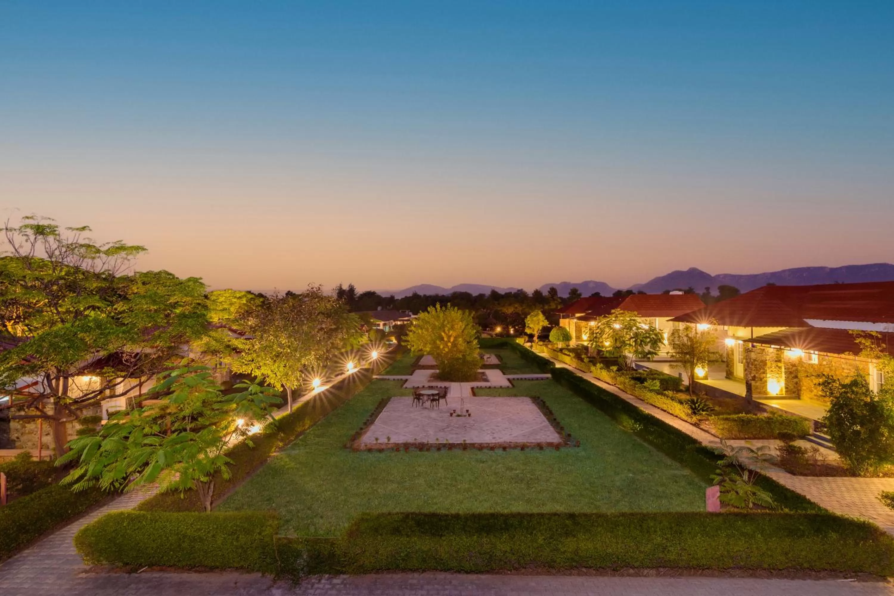 Sunset in Astroport Sariska Treetop by Eight Continents