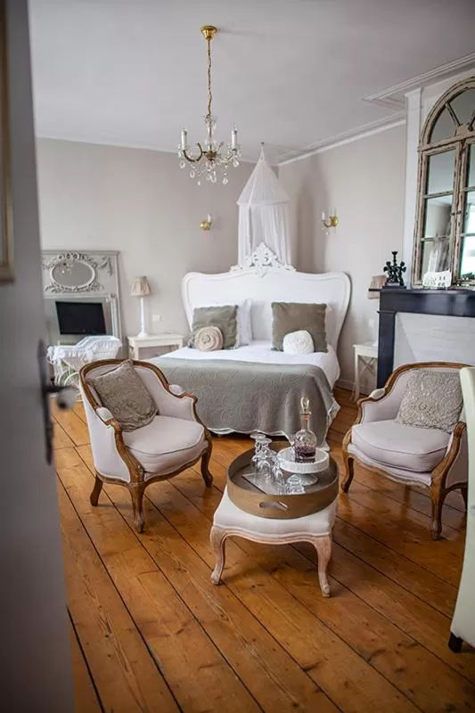 Bed in Bienvenue Chez Nous