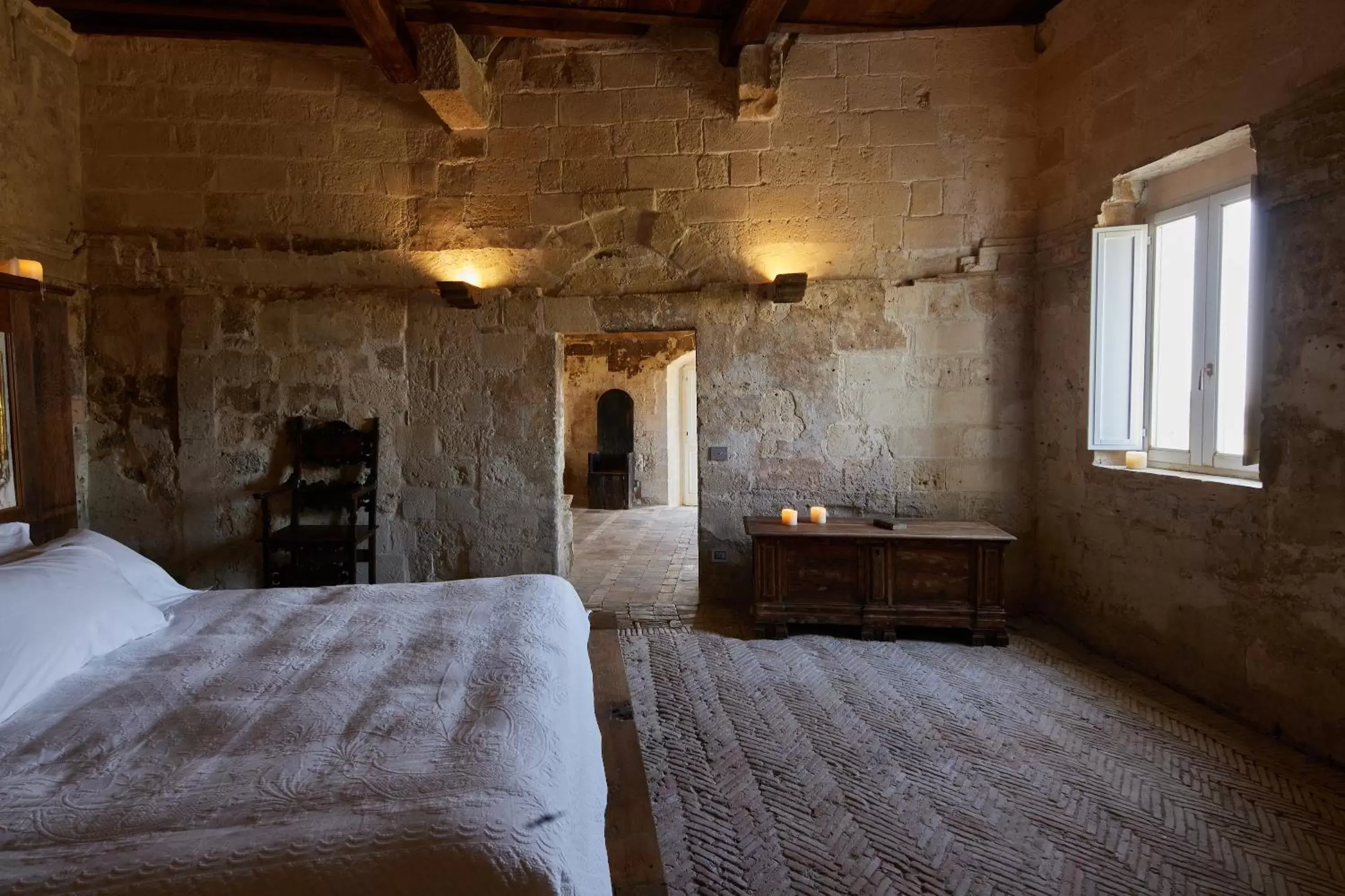 Photo of the whole room, Bed in Sextantio Le Grotte Della Civita