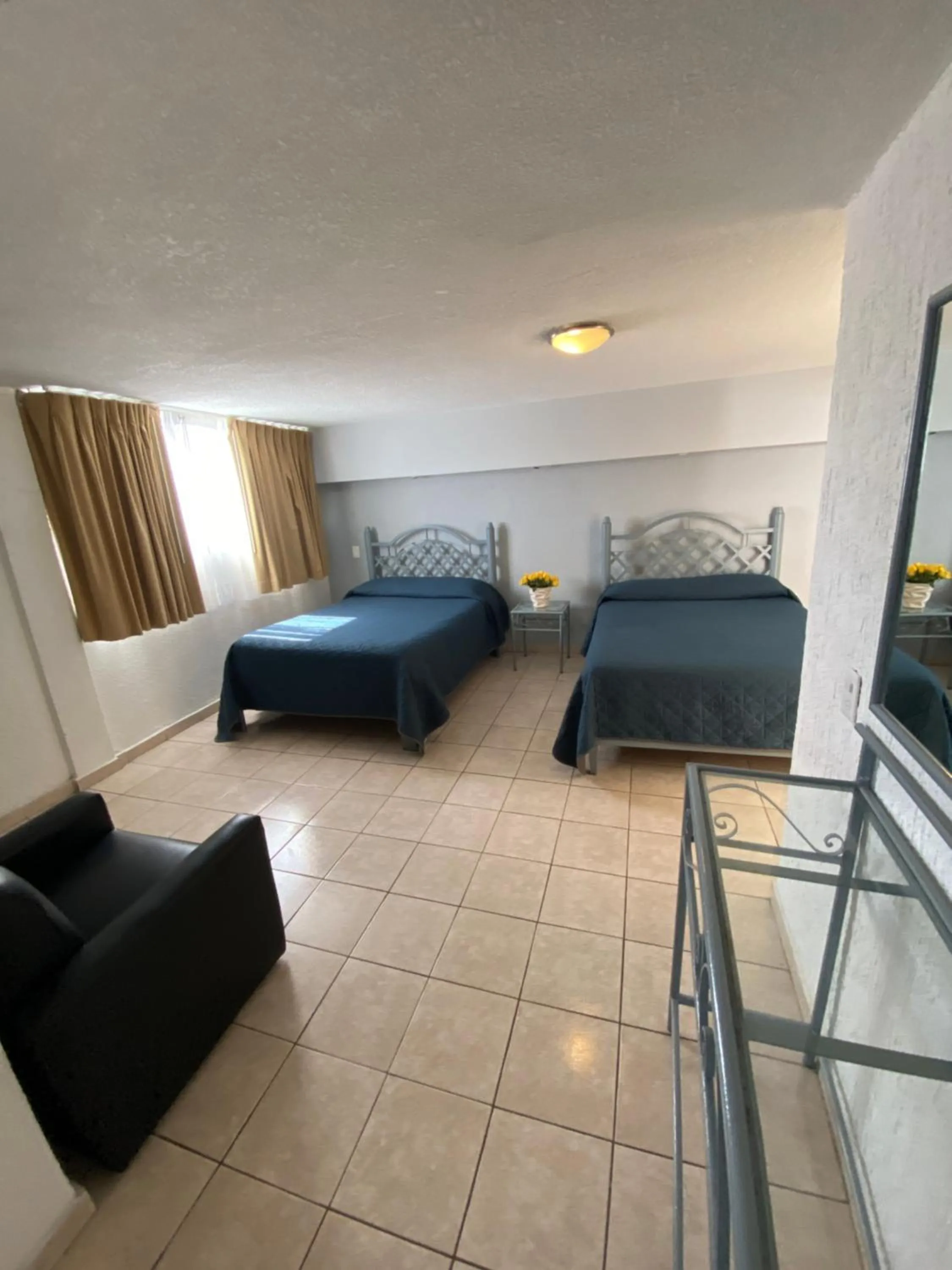 Bed in Hotel Qualitel Plus