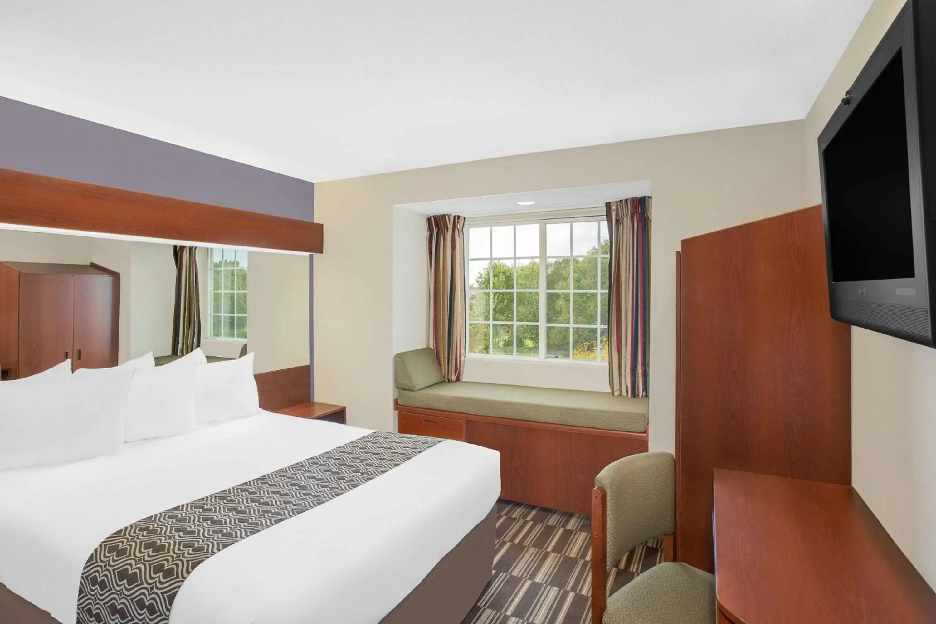 Photo of the whole room, Bed in Microtel by Wyndham Bentonville