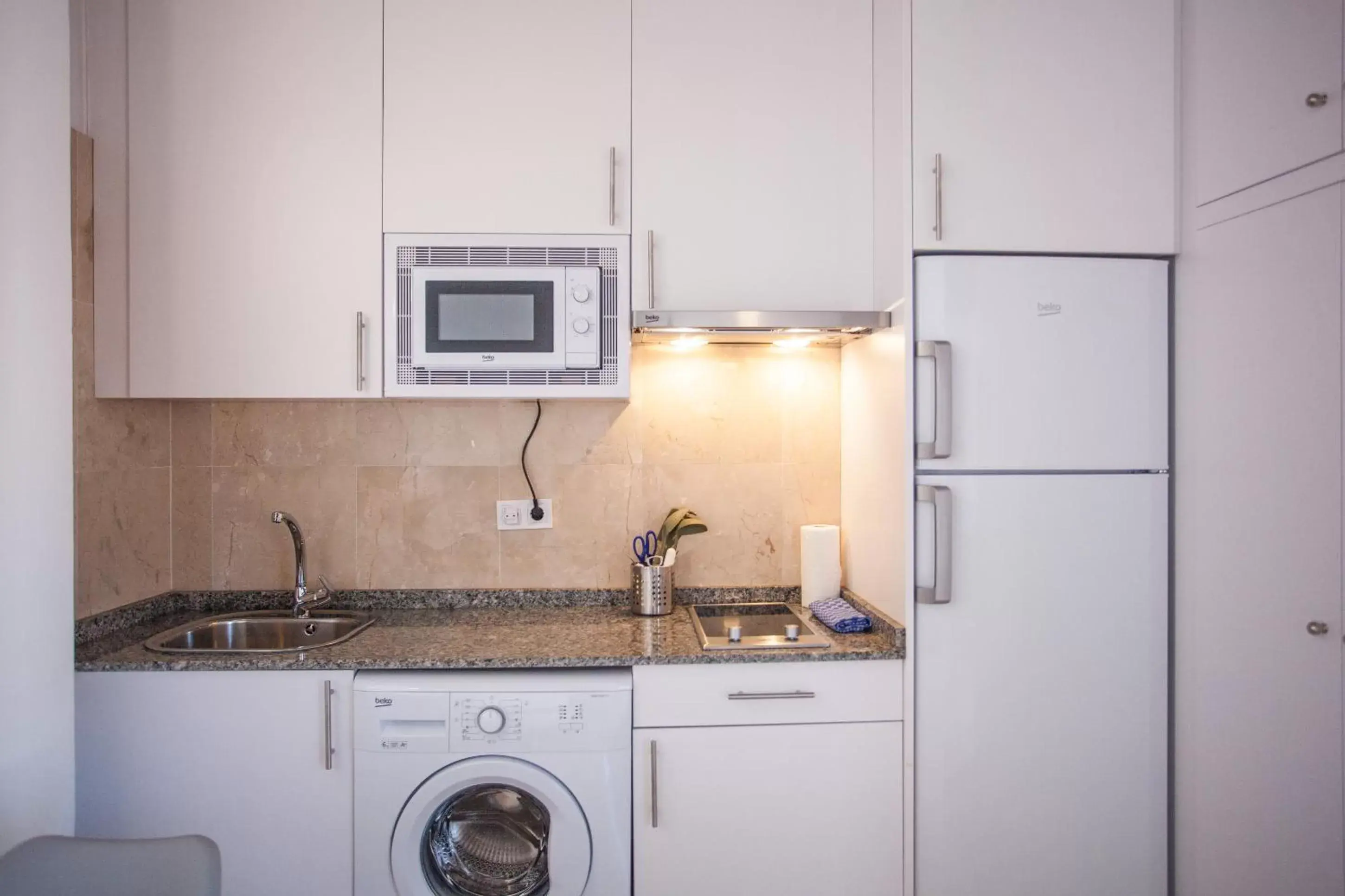 Kitchen or kitchenette in Gran Central Suites Kitchen or kitchenette in Gran Central Suites