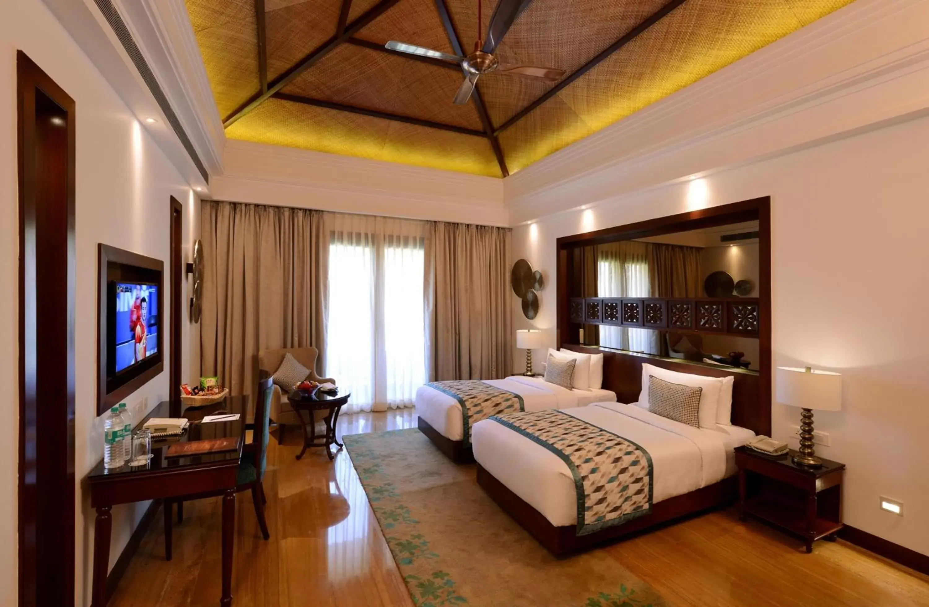 Bedroom, TV/Entertainment Center in The Ananta Udaipur Resort & Spa