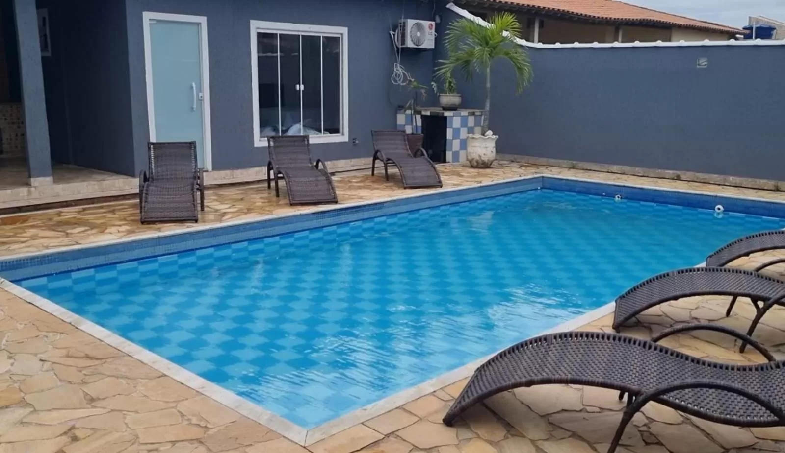 Swimming pool in Pousada Litorânea