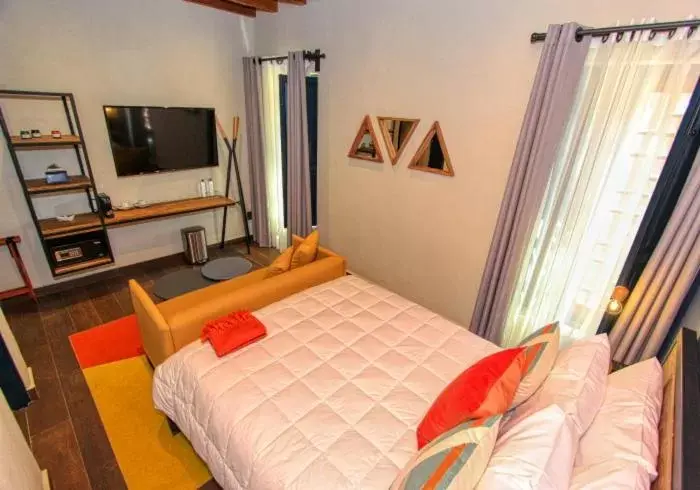 Bed in Antigua Trece Hotel Fusión