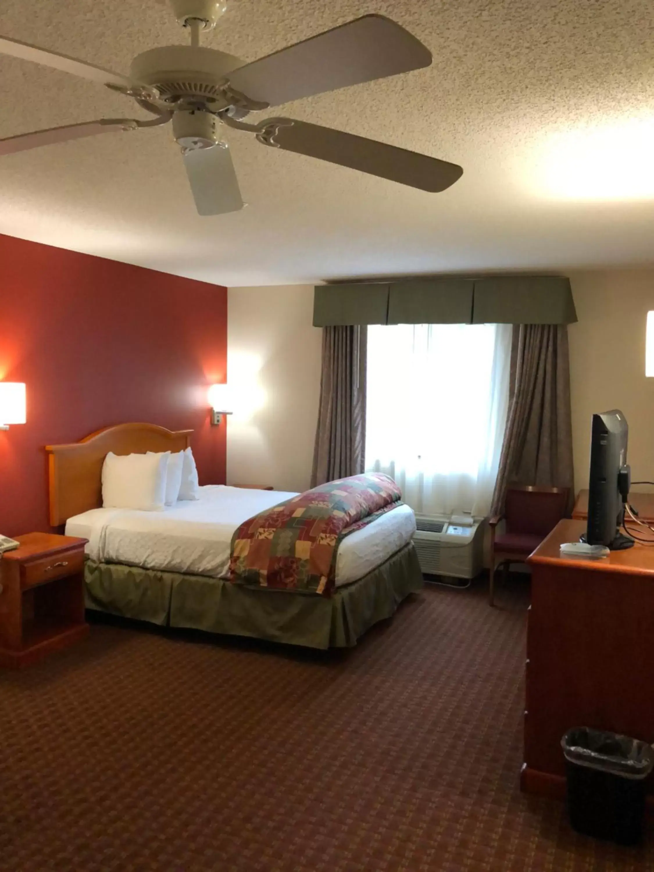 Bed in Millennium Inn Bed in Millennium Inn