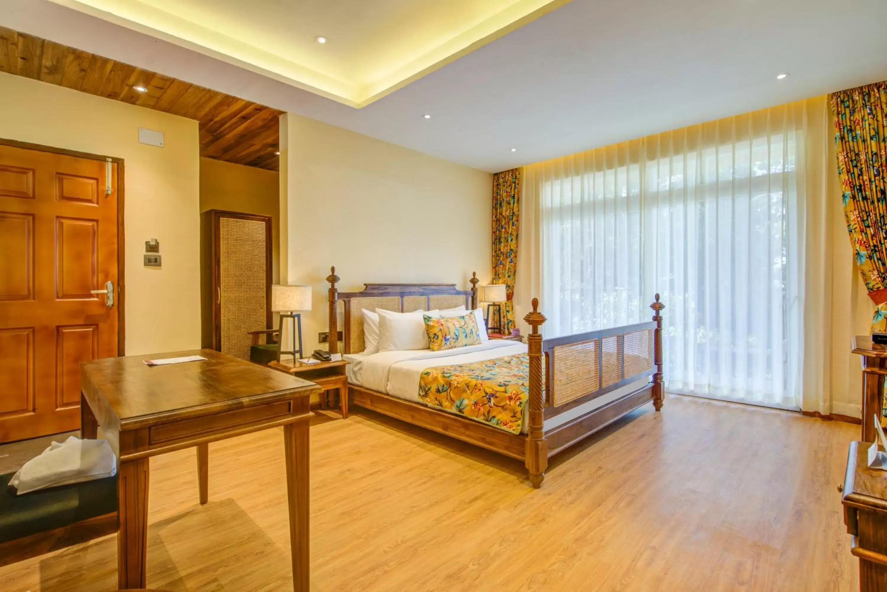 Bed in Summit Barsana Resort & Spa