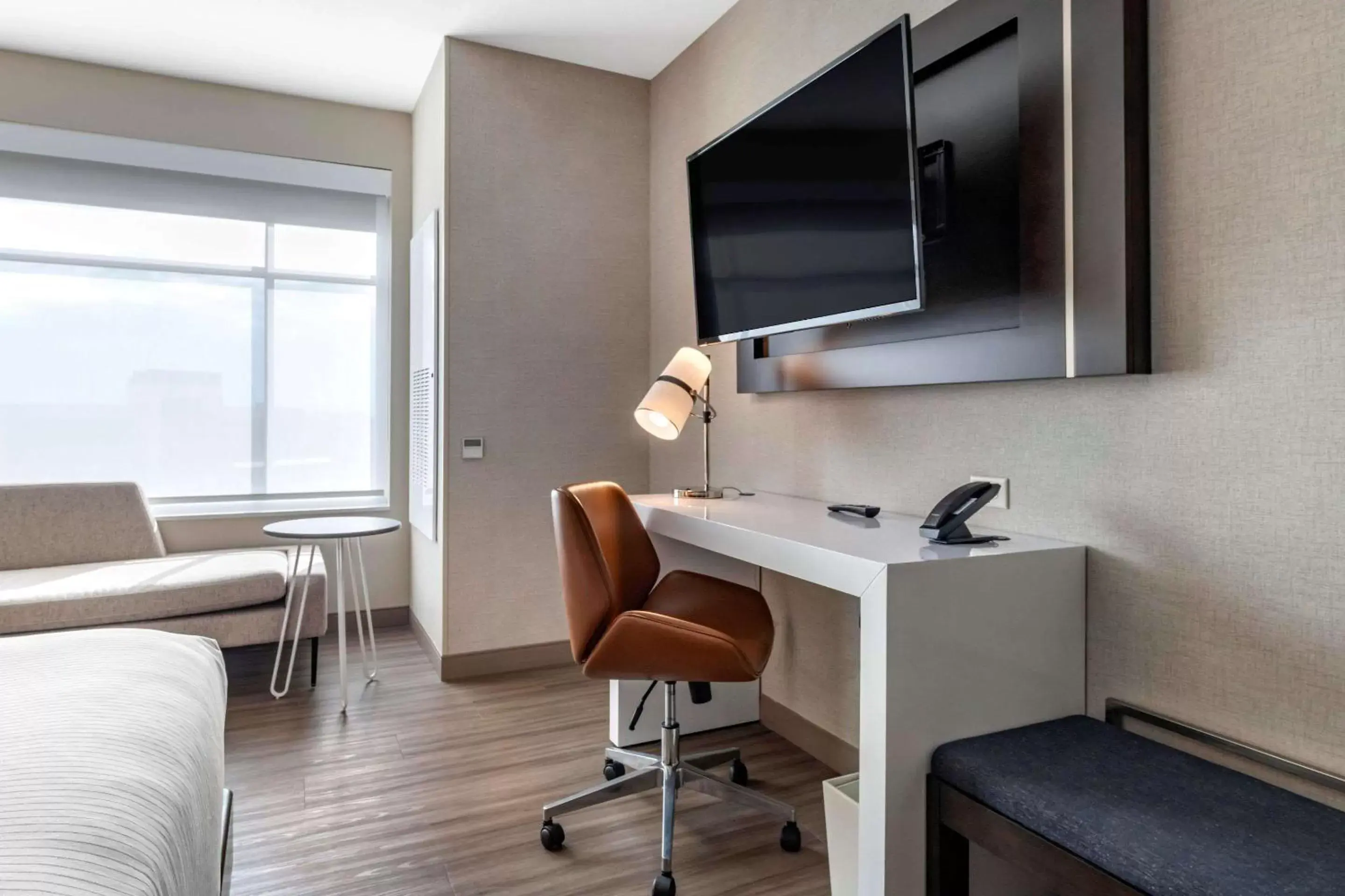 Photo of the whole room, TV/Entertainment Center in Cambria Hotel Bloomington Mall of America Minneapolis Airport